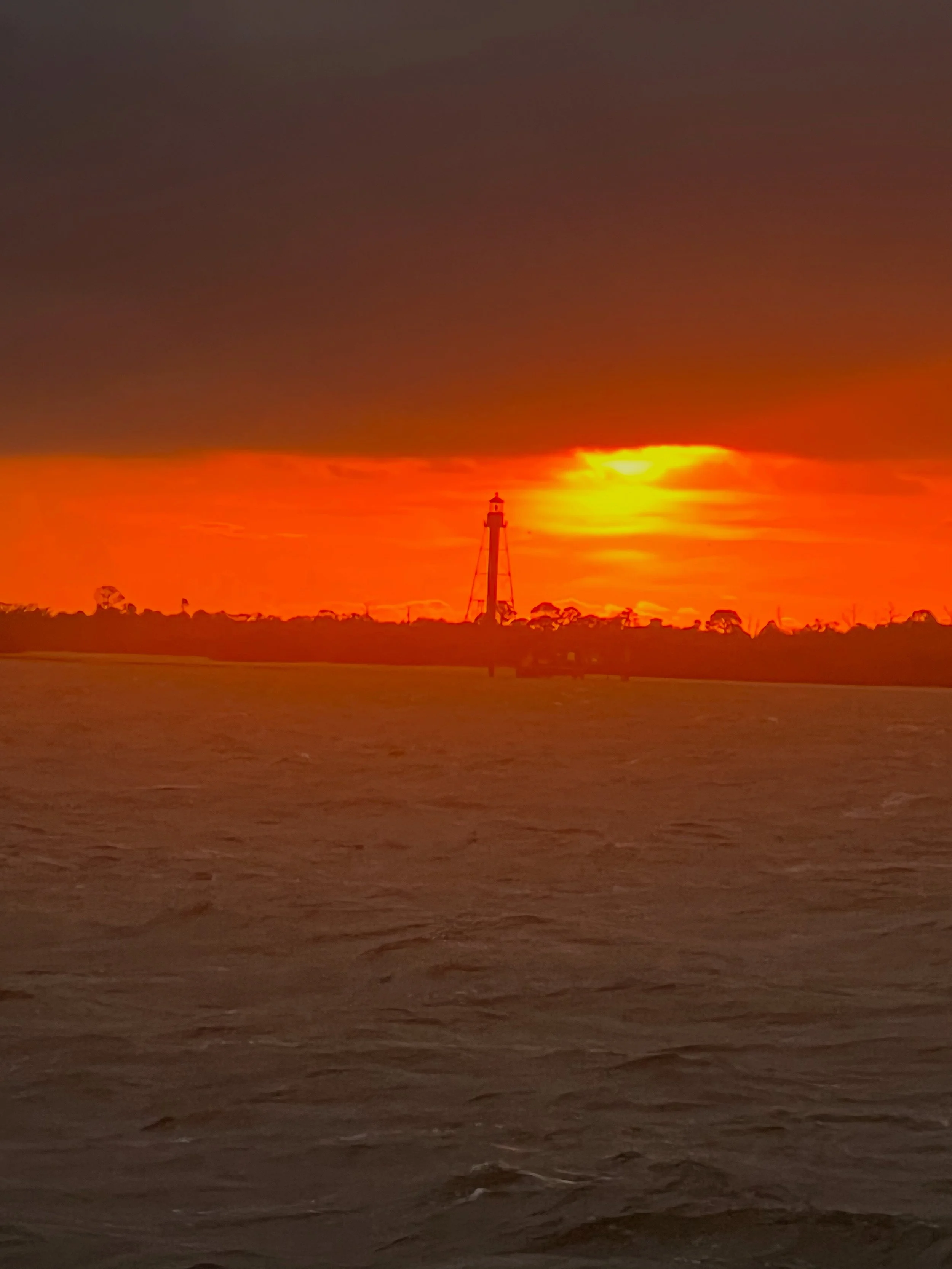 SUNSETS AT ANCLOTE LIGHT HOUSE