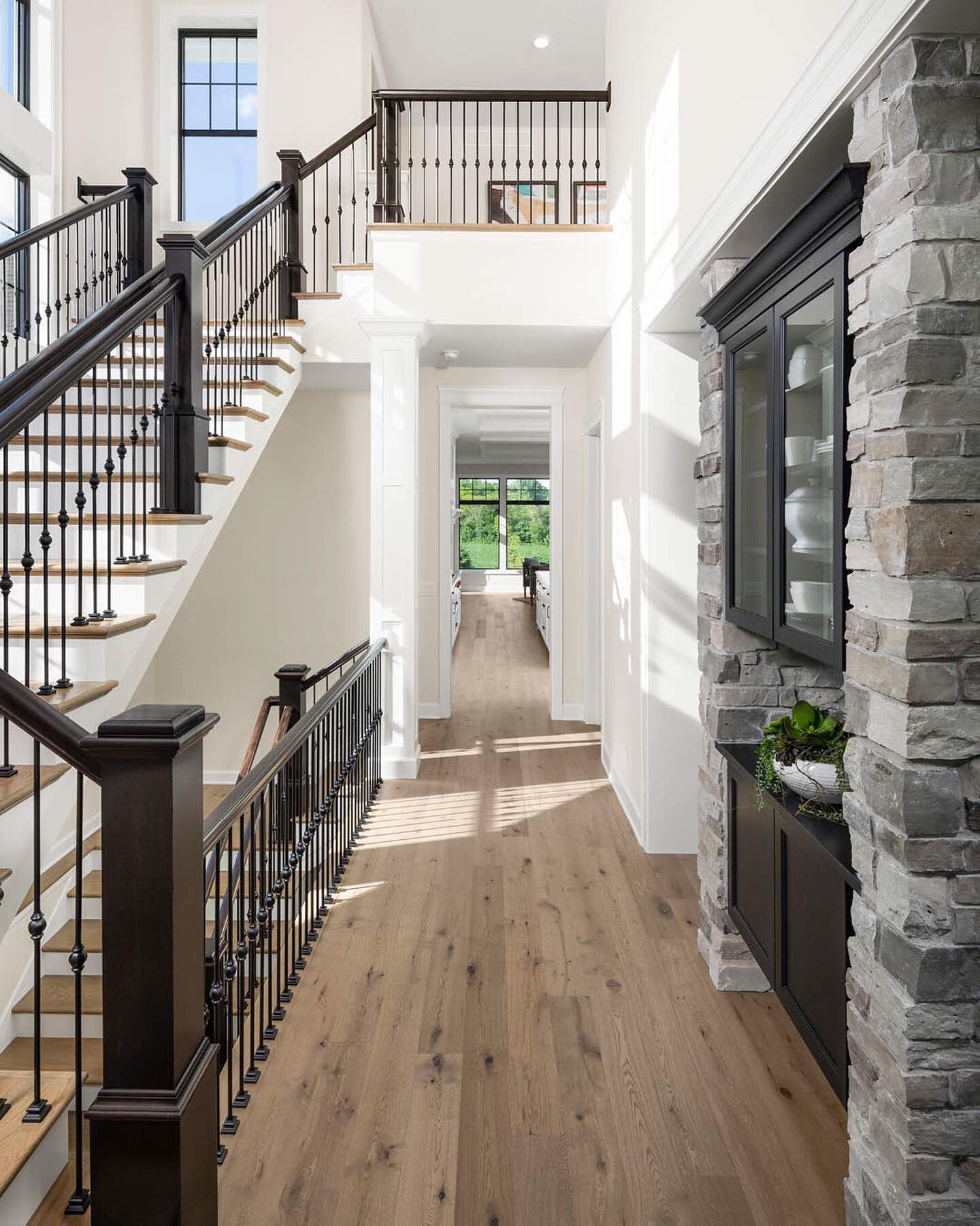 We love capturing the details that make your project one of a kind. Contact us to plan photography for your space.
Home by: @customonehomesmn 

#stairwaydesign #interiorphotgraphy #homeinteriors #homestairway #hallwaydesign #railing #stairs #woodfloo