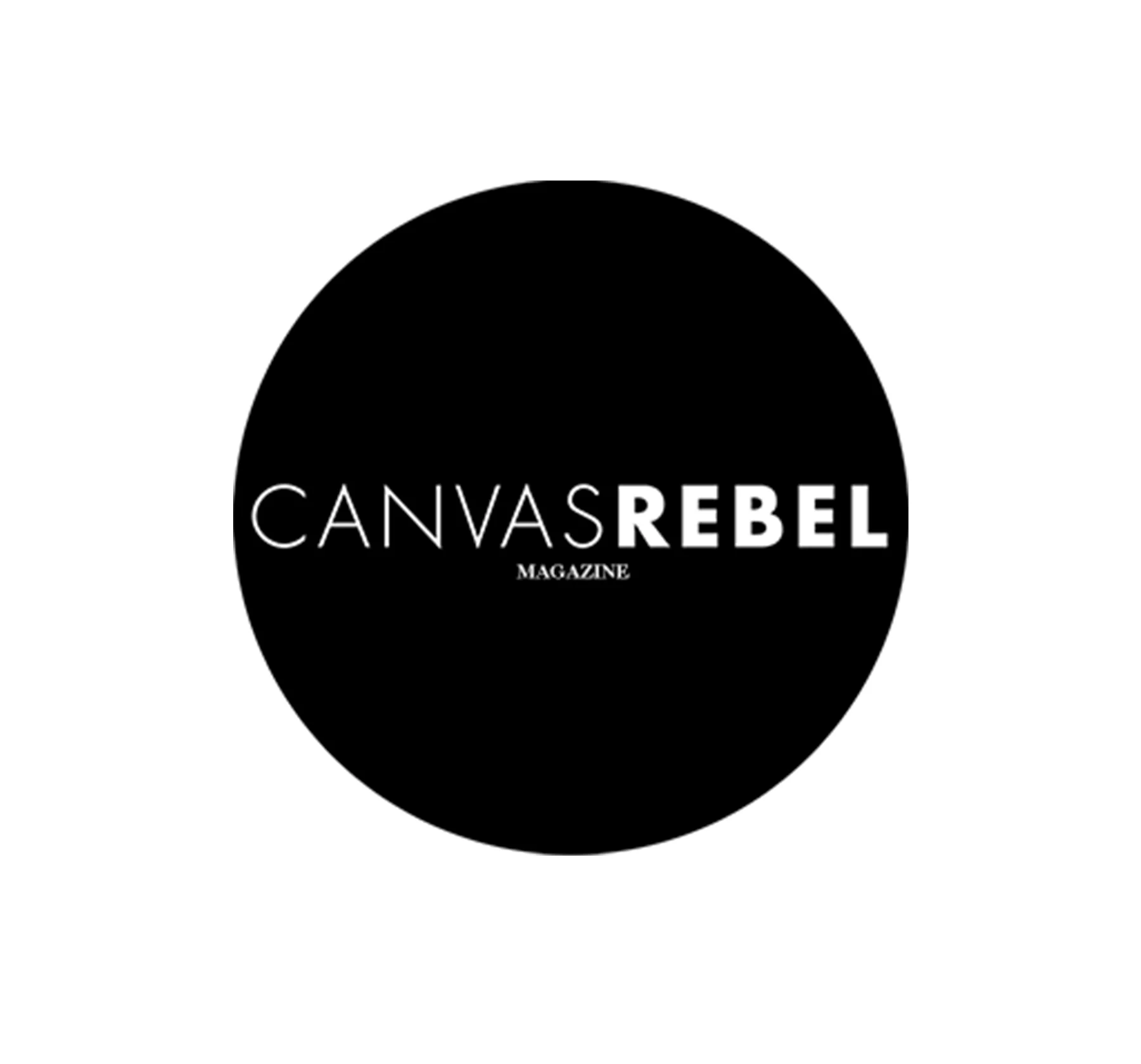 Black circular background with the text 'CANVAS REBEL MAGAZINE' in white, modern font in the center.