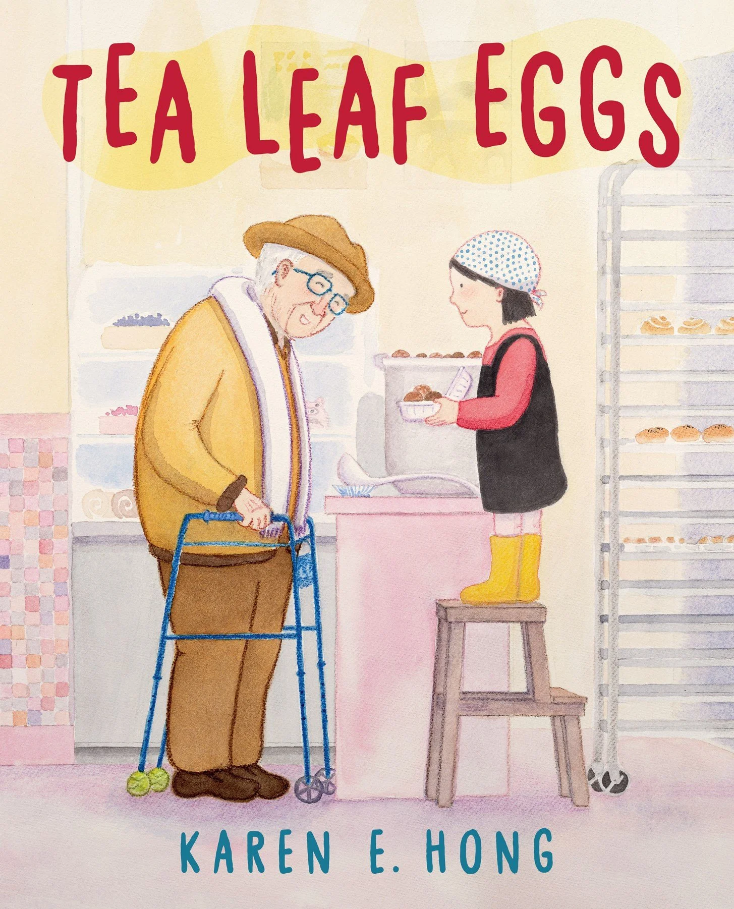 Book cover titled "Tea Leaf Eggs" by Karen E. Hong, featuring an illustration of an elderly man with a cane and an elderly woman selling tea leaf eggs at a market, with shelves of baked goods in the background.