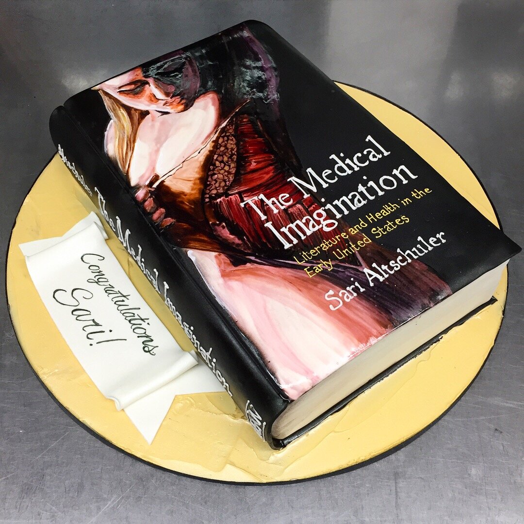 Painted Medical Book Cake