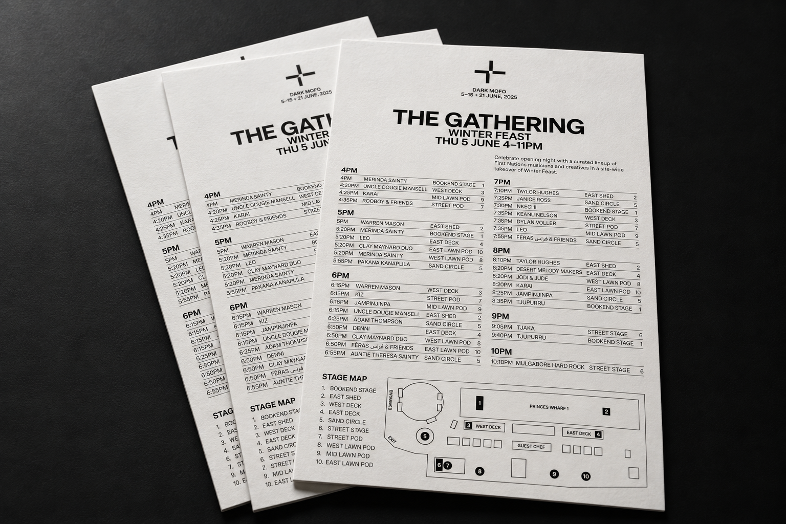Mock-up of The Gathering 2025 program cards on a black table, showing performance times, stage names and the Winter Feast site map.