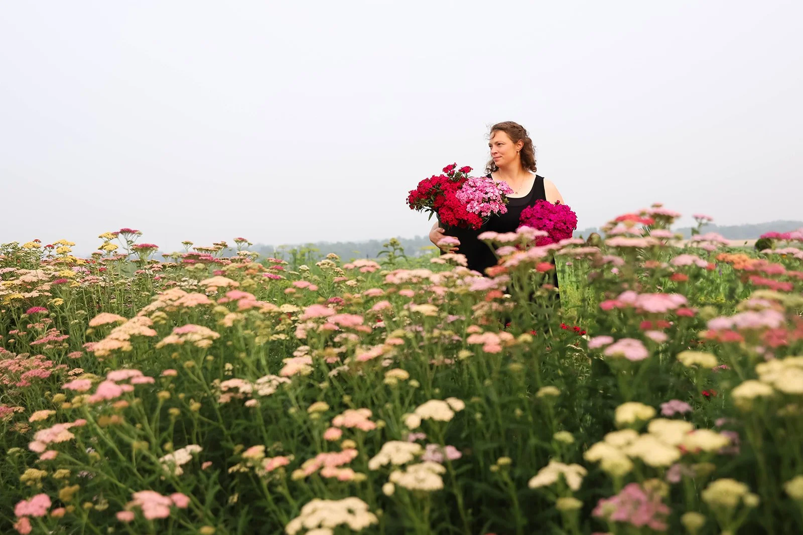 Flower Farm Michigan - woman holding a bouquet of flowers