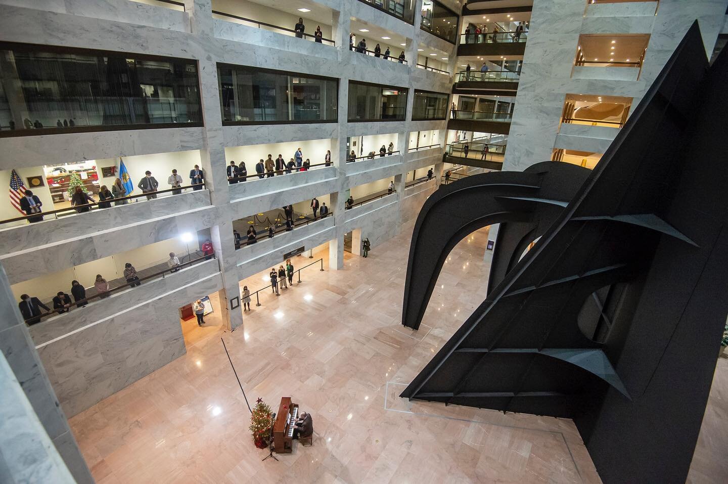 Sen. Lamar Alexander (R-Tenn) plays Christmas music on the piano for senators and staffers in the Hart Atrium. Truly the most tender Capitol Hill moment