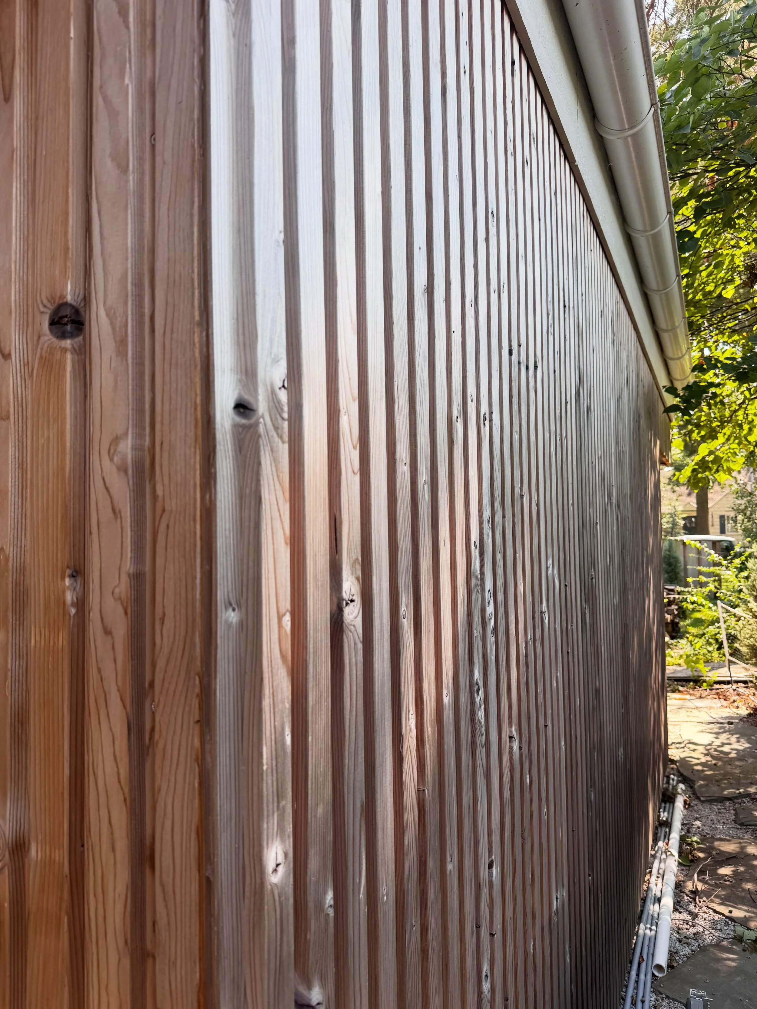Wrapping up the exterior on this gorgeous ADU.  This back corner space was to be the mower garage. The architect owner envisioned it as a sauna and invited me to make the dream a reality, so we designed and created a sauna to meet the aesthetic of th