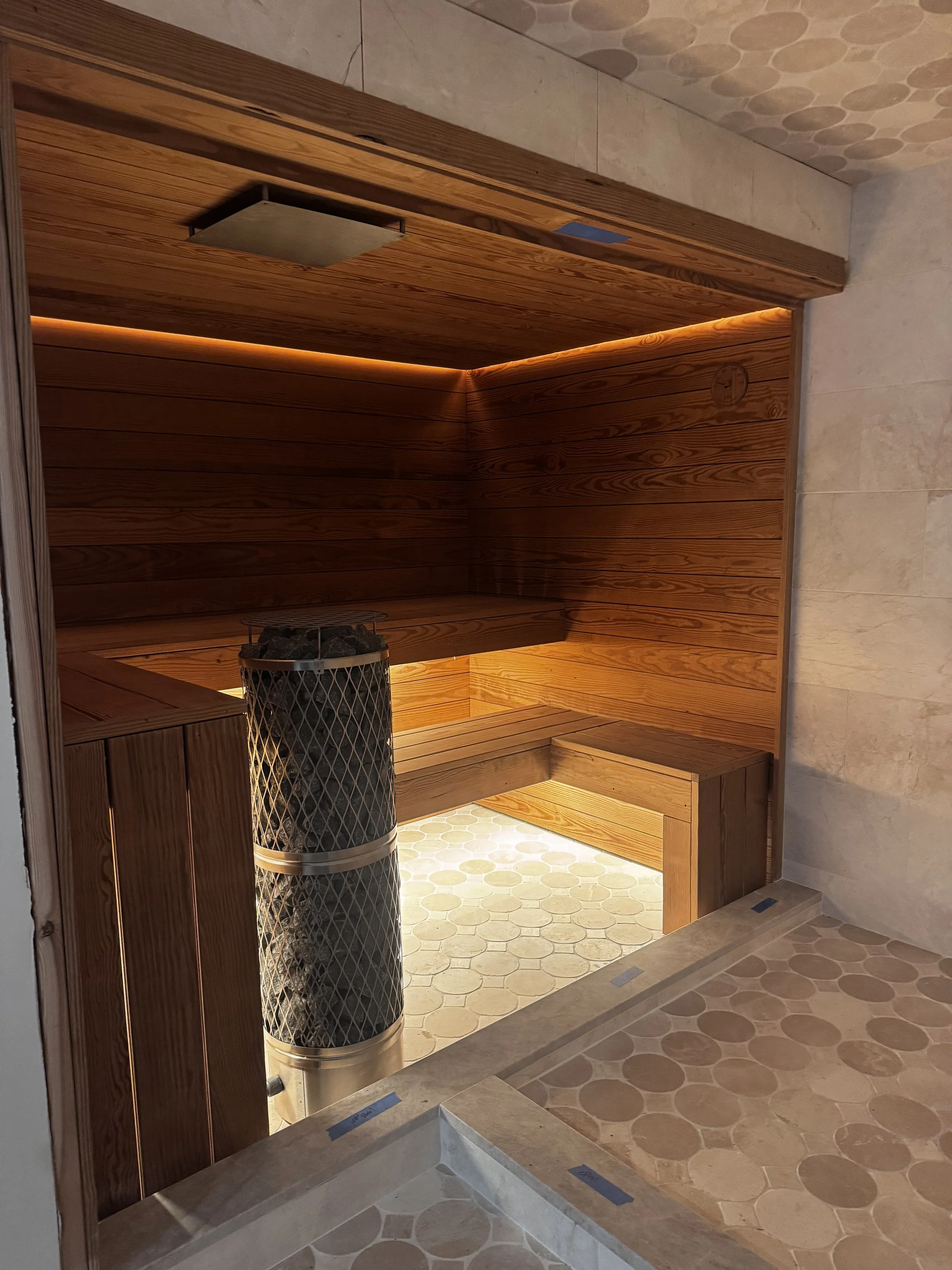 Custom Sauna behind bathroom shower