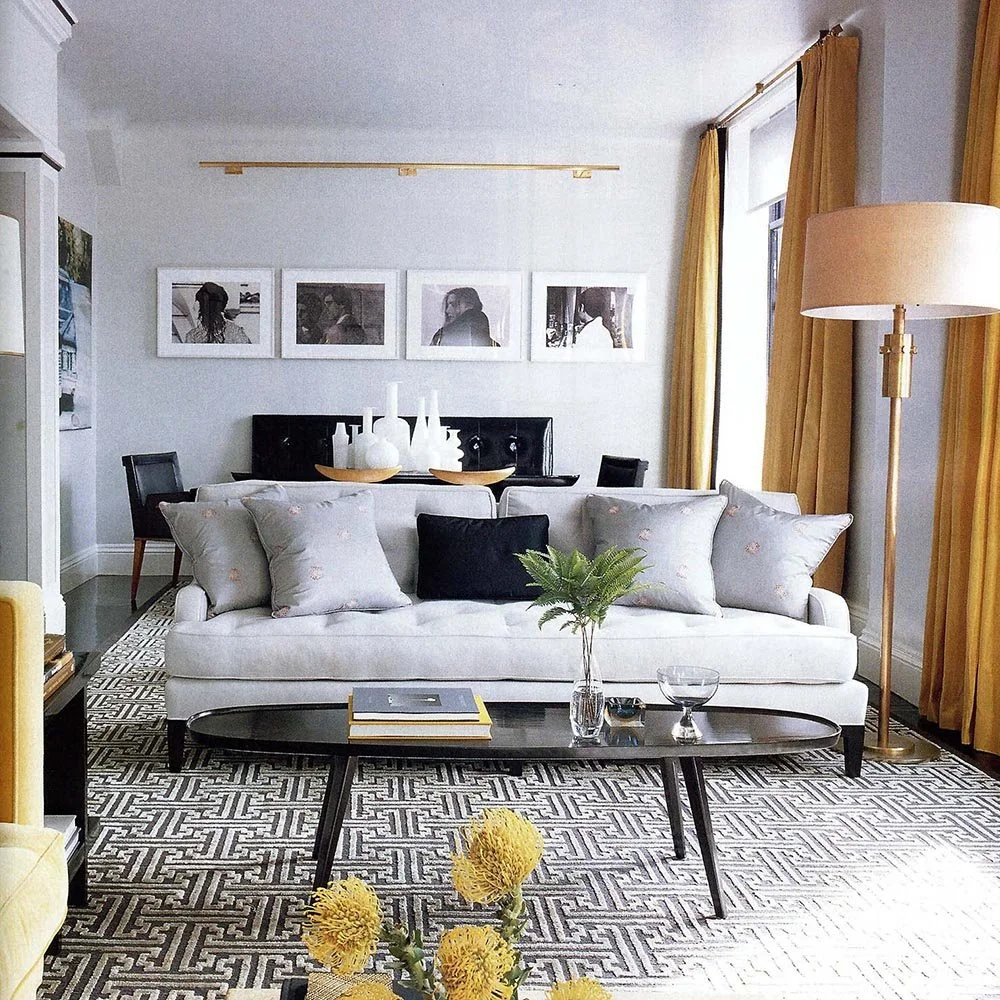 modern-lighting-Steven-Gambrel-Elle-Decor-gold-linear-sconce-art-light.jpg