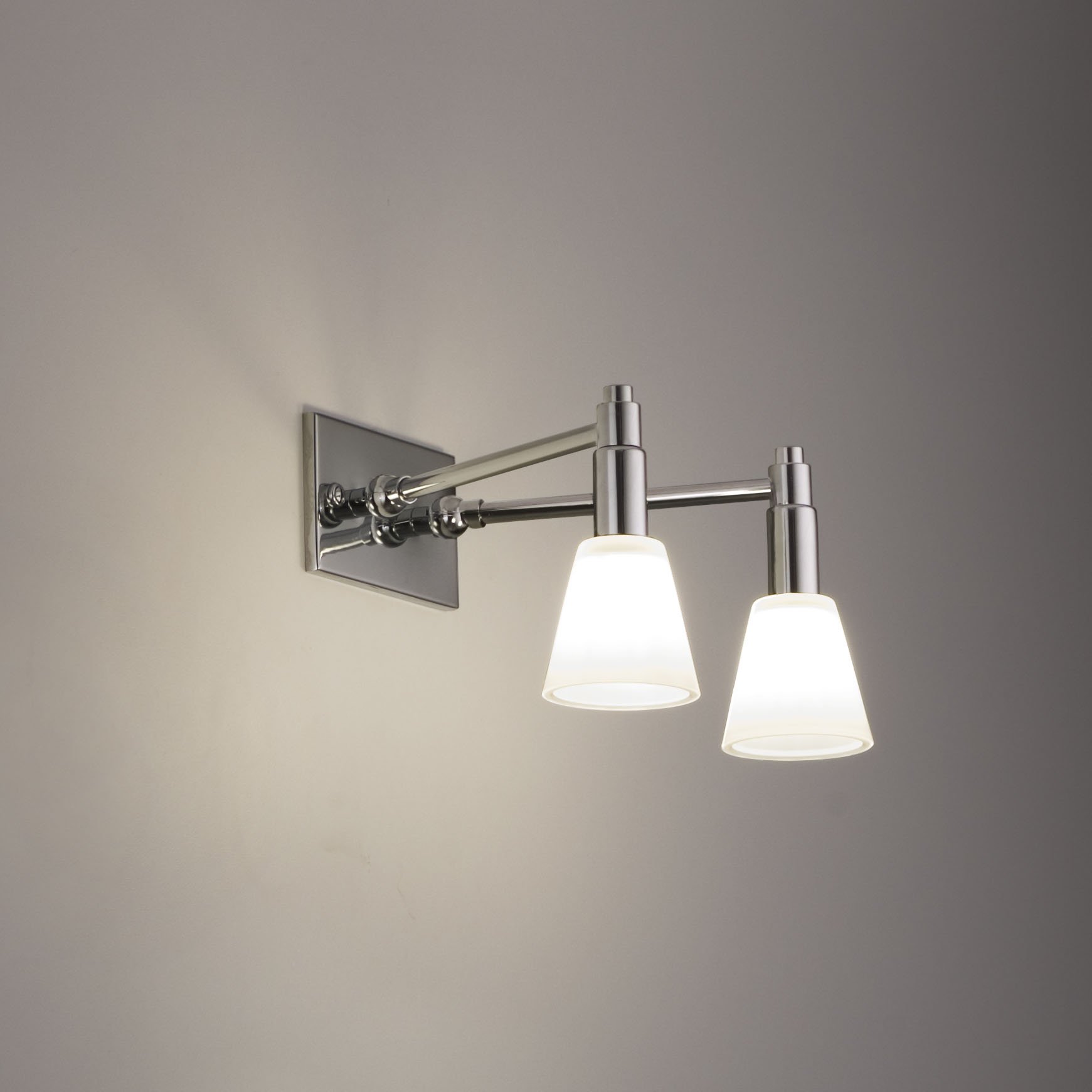 horizontal rectangular mounting plate with two angled arms projecting out each with a white, milky conical glass luminary