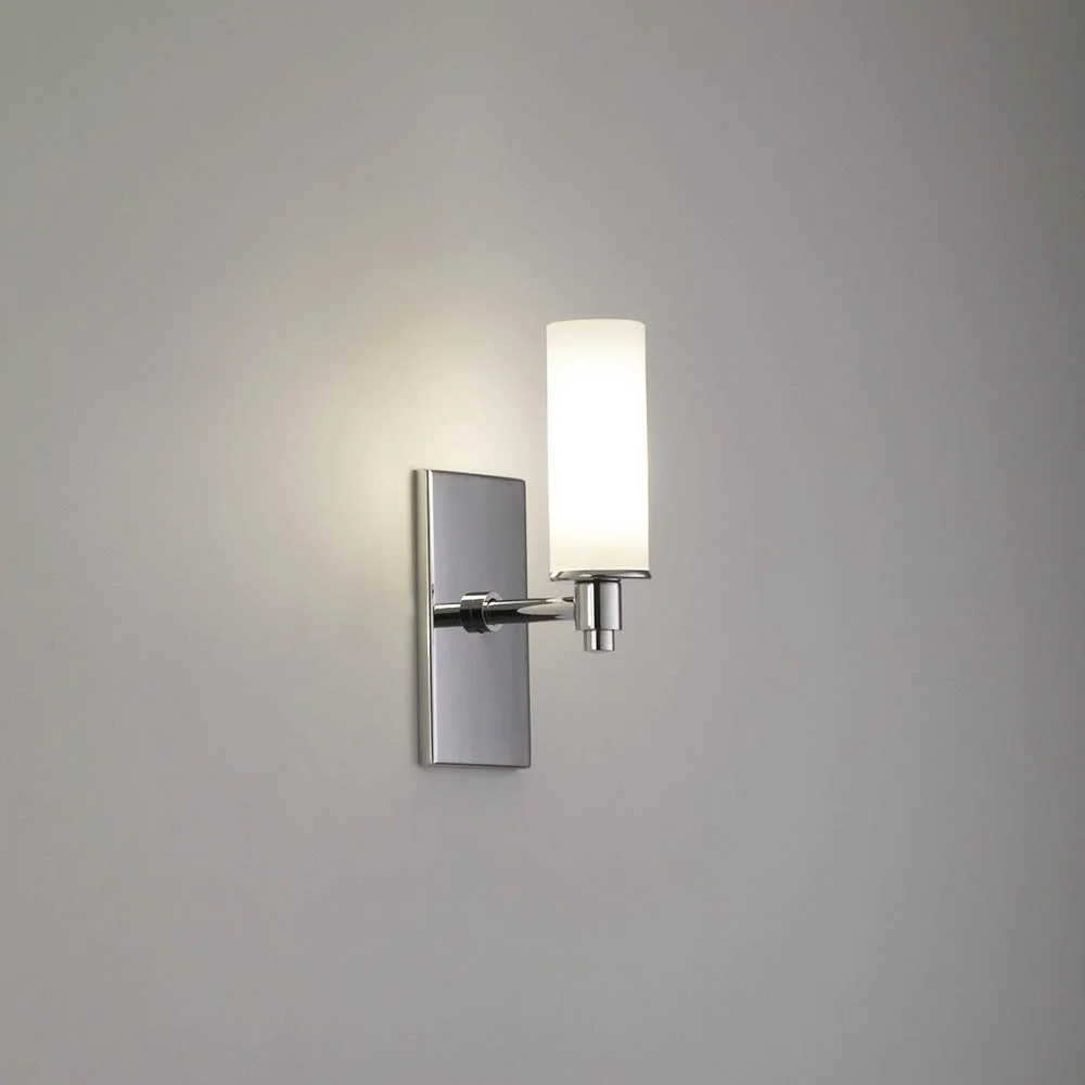 a short glass tube illuminated with a polished chrome body and mounting plate