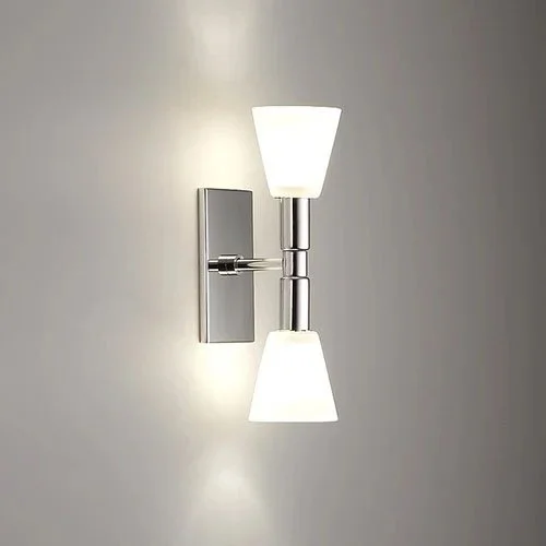a top and bottom double milky glass luminary illuminated sconce with a vertical rectangular mounting plate in polished chrome