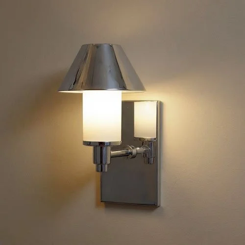 contemporary candle-looking light fixture with a metal shade