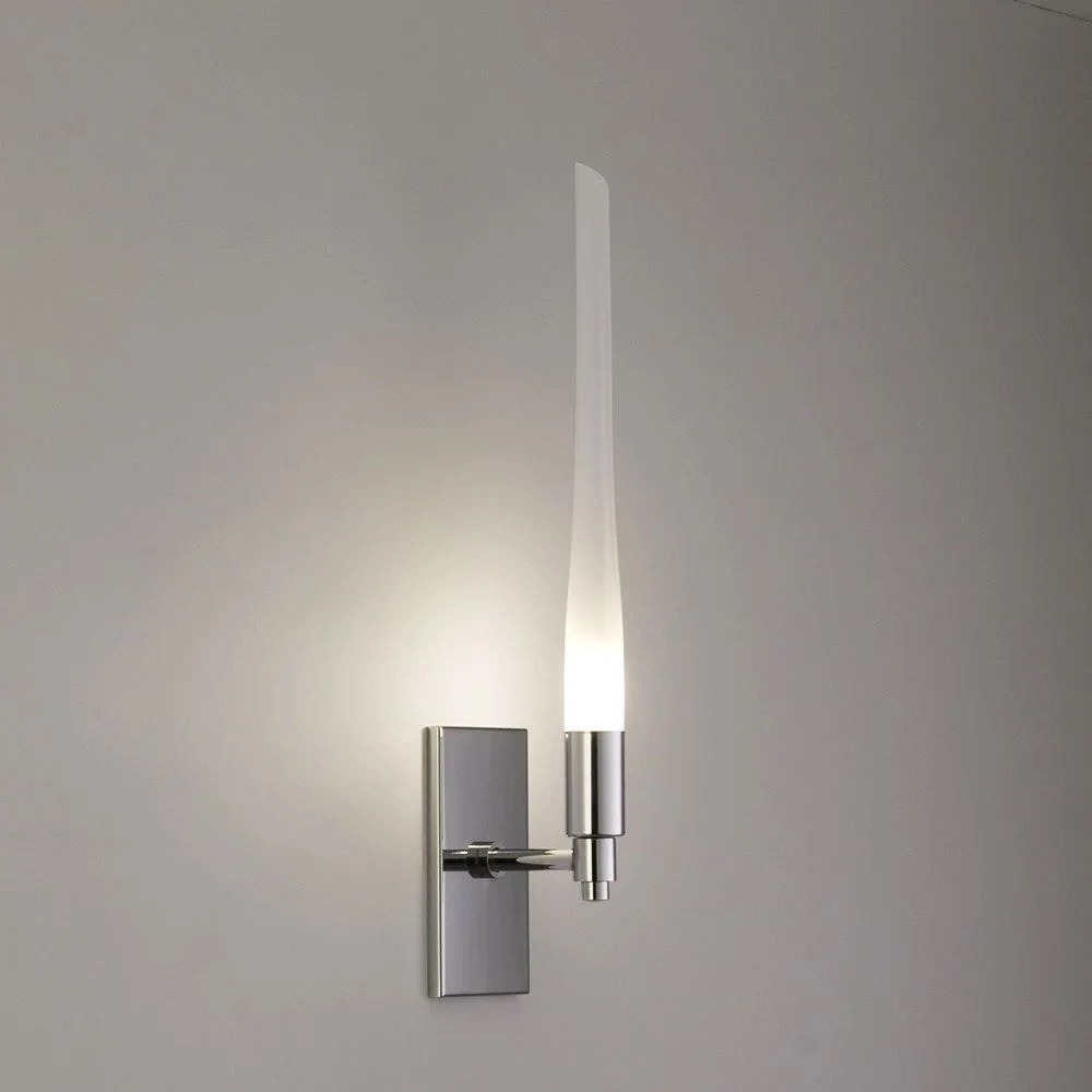 very slender glass and metal illuminated sconce with a vertical rectangular wall plate with no screws visible