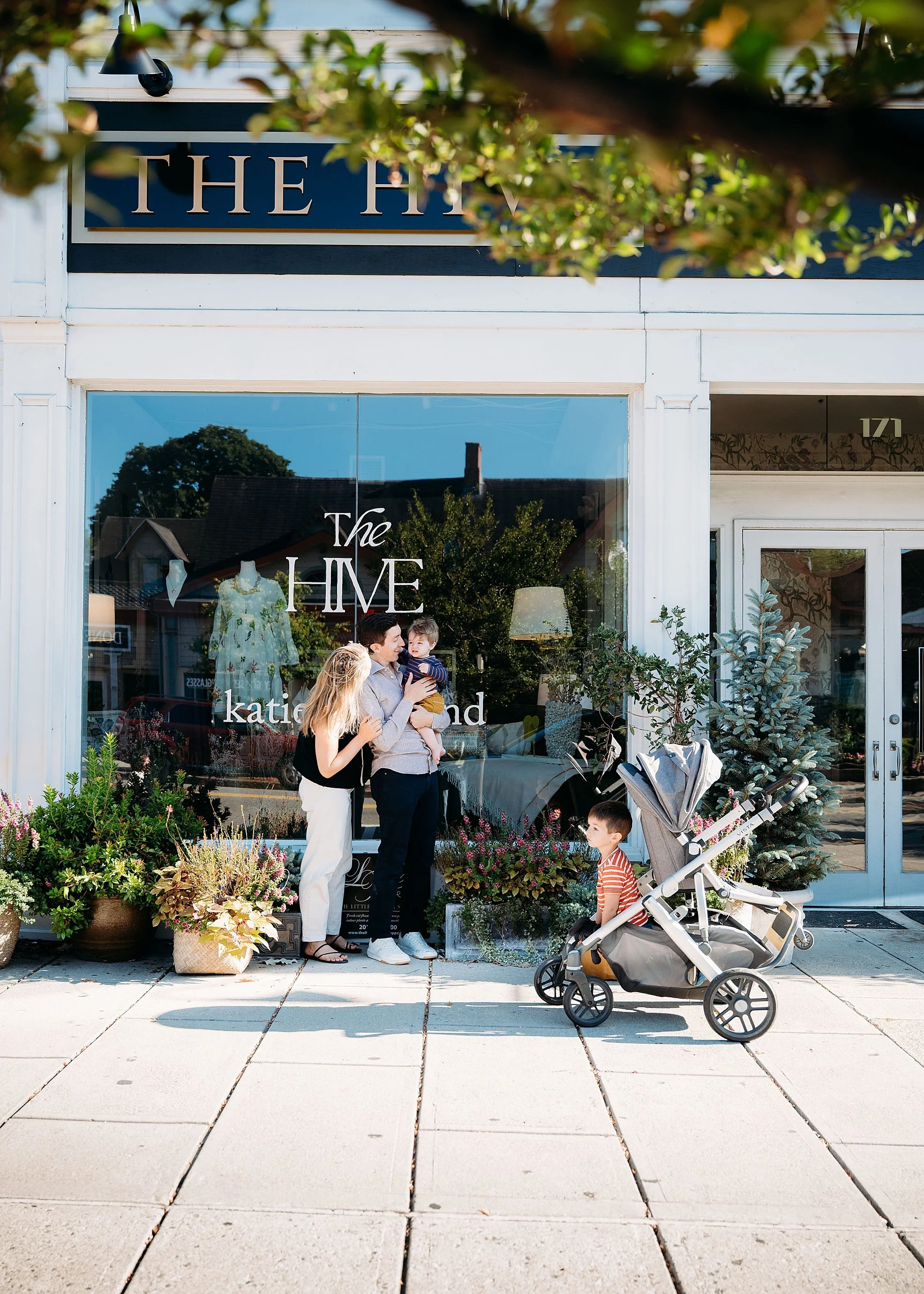 A family of four strolling downtown 