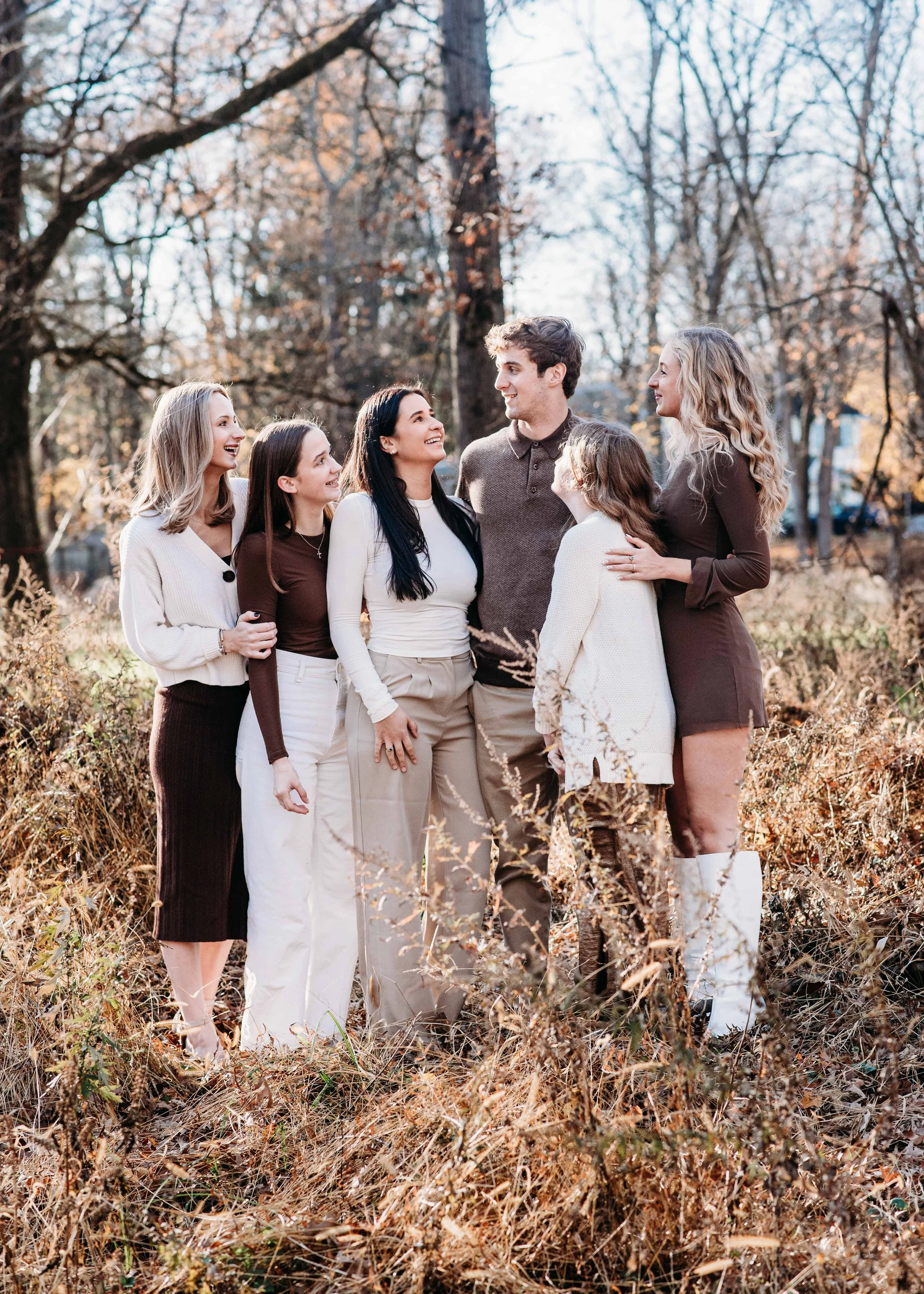 Siblings relaxing at a park 