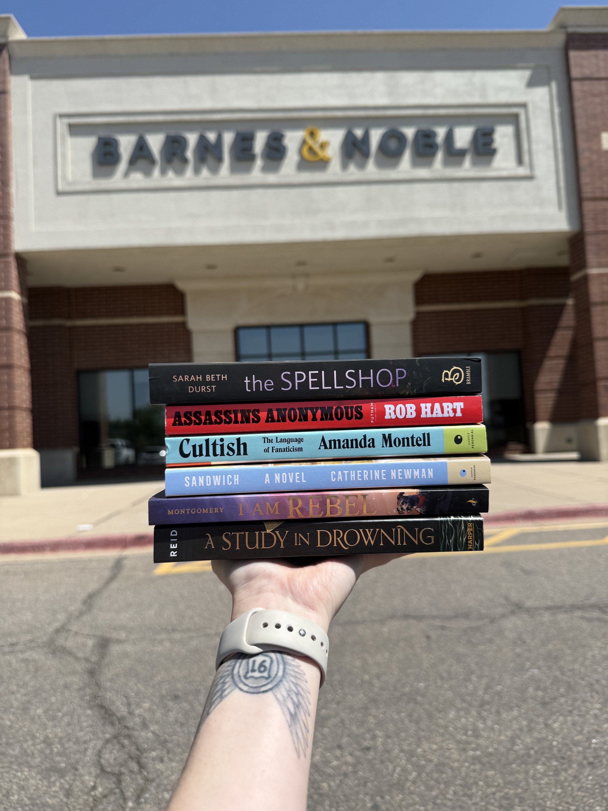Barnes and Noble monthly picks stacked in front of the Littleton, Colorado Barnes & Noble.