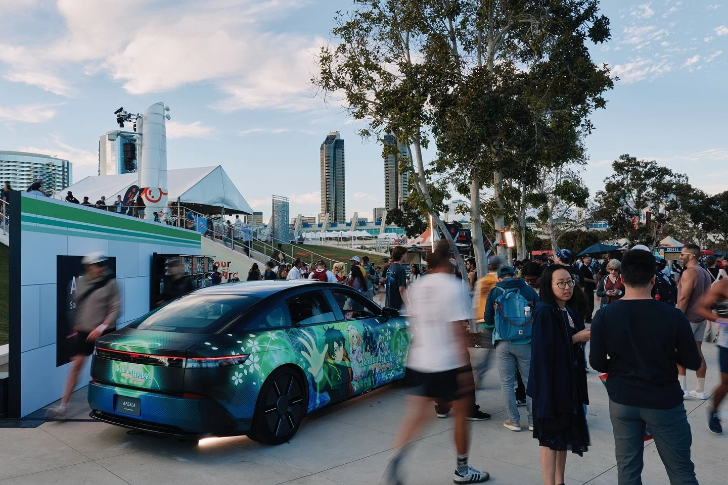 Meet the first-ever wrapped AFEELA by @shmafeela &mdash;brought to life in full Brilliant Healers itasha style by Wrap Legends, with design support from @aws_graphics . Unveiled at Comic Con 2025 as part of the @crunchyroll activation, this EV fuses 