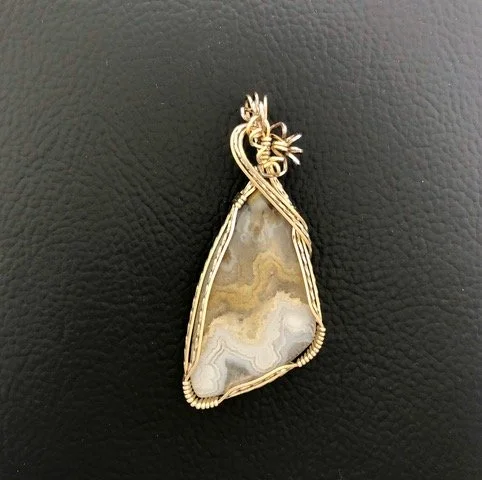 Deborah Marchese golden marble pendant.jpeg