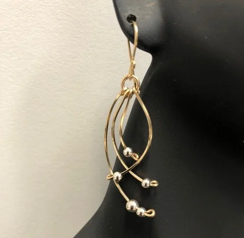 Deborah Marchese gold spider earrings.jpeg