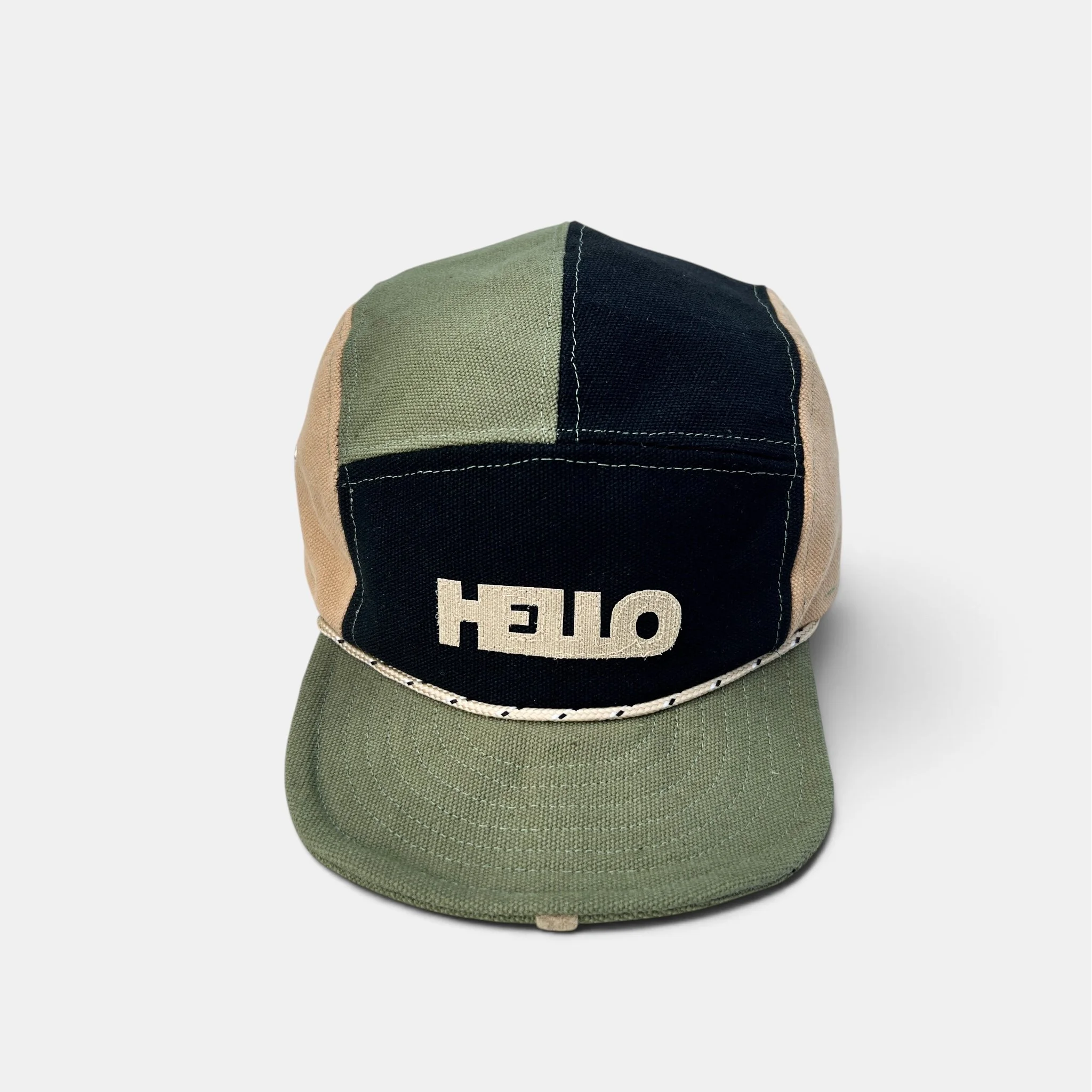 Olive, black and beige five-panel canvas cap with personalised beige HELLO motif and wired visor.