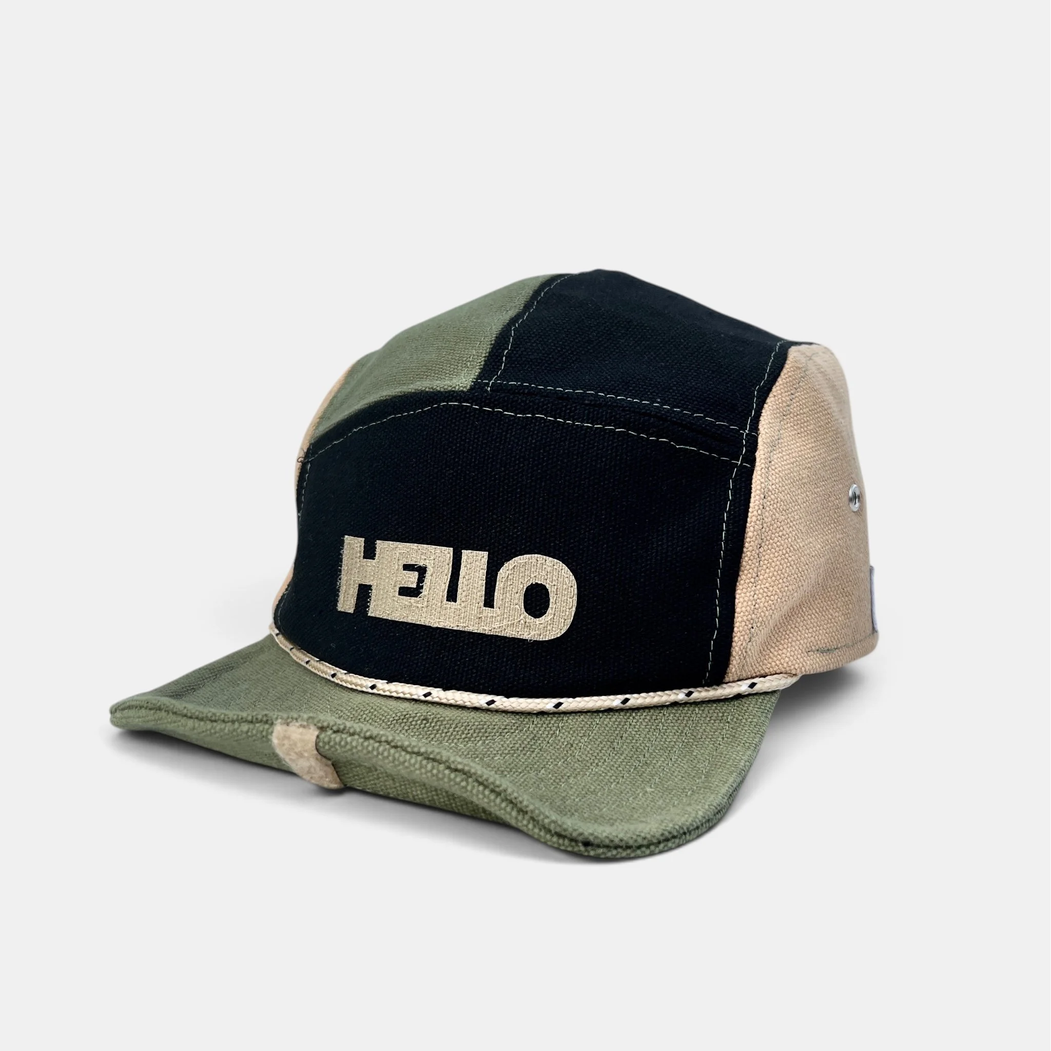 Olive, black and beige cotton canvas five-panel cap with HELLO motif, rope trim and olive roll-up visor.