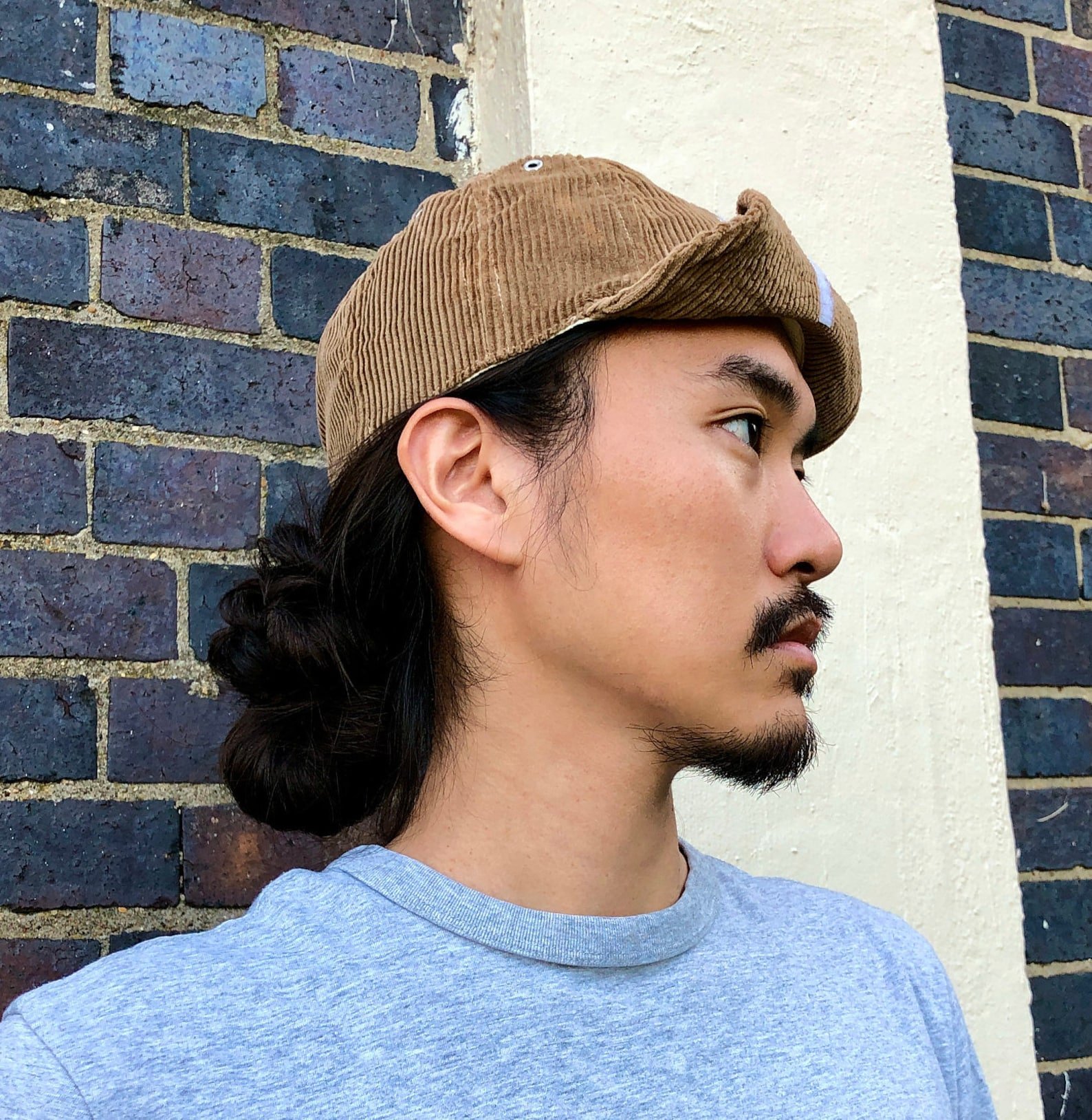 beige_corduroy_cap_on_model.jpg