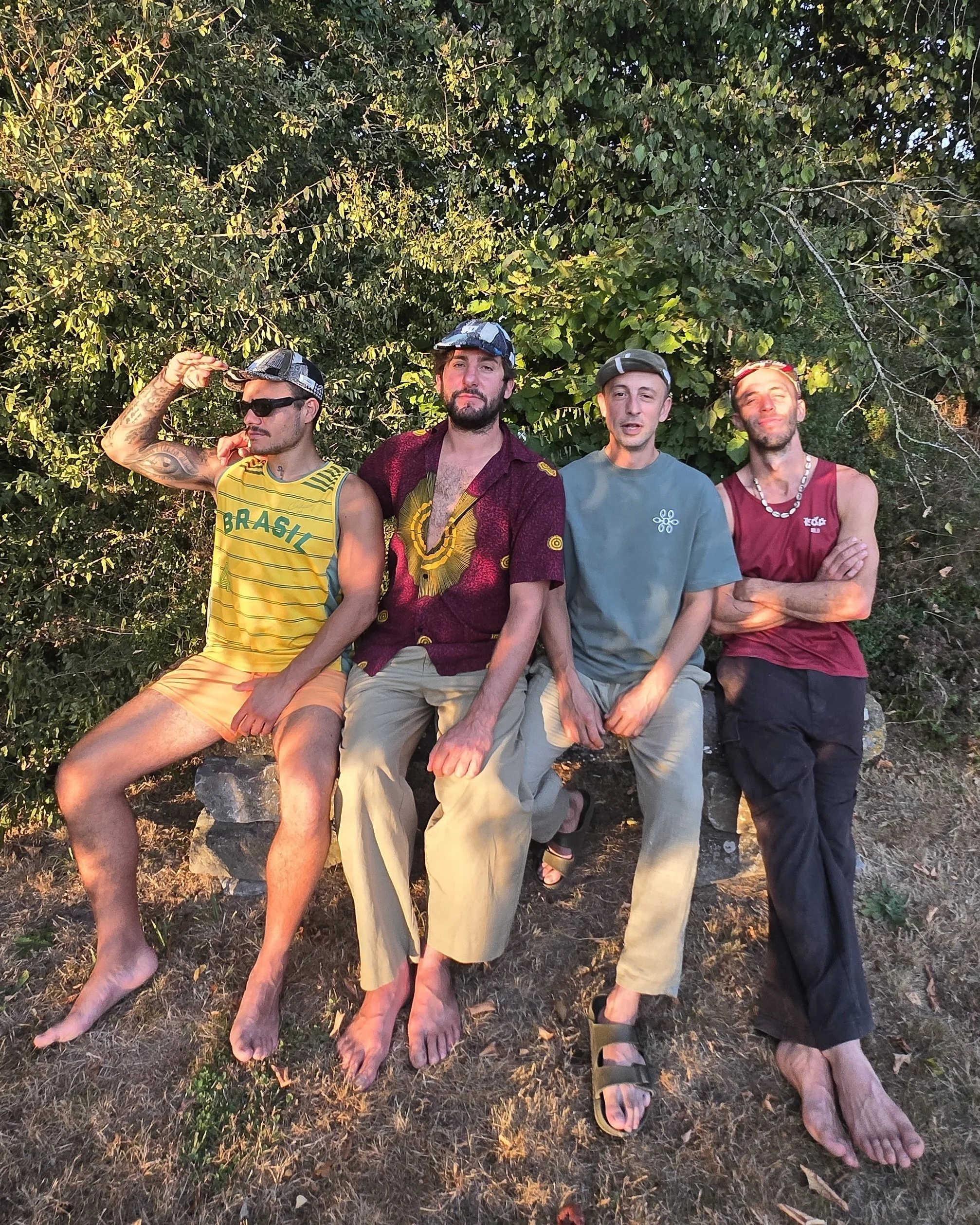 Makshy patchwork cap worn outdoors with friends in warm summer evening light.