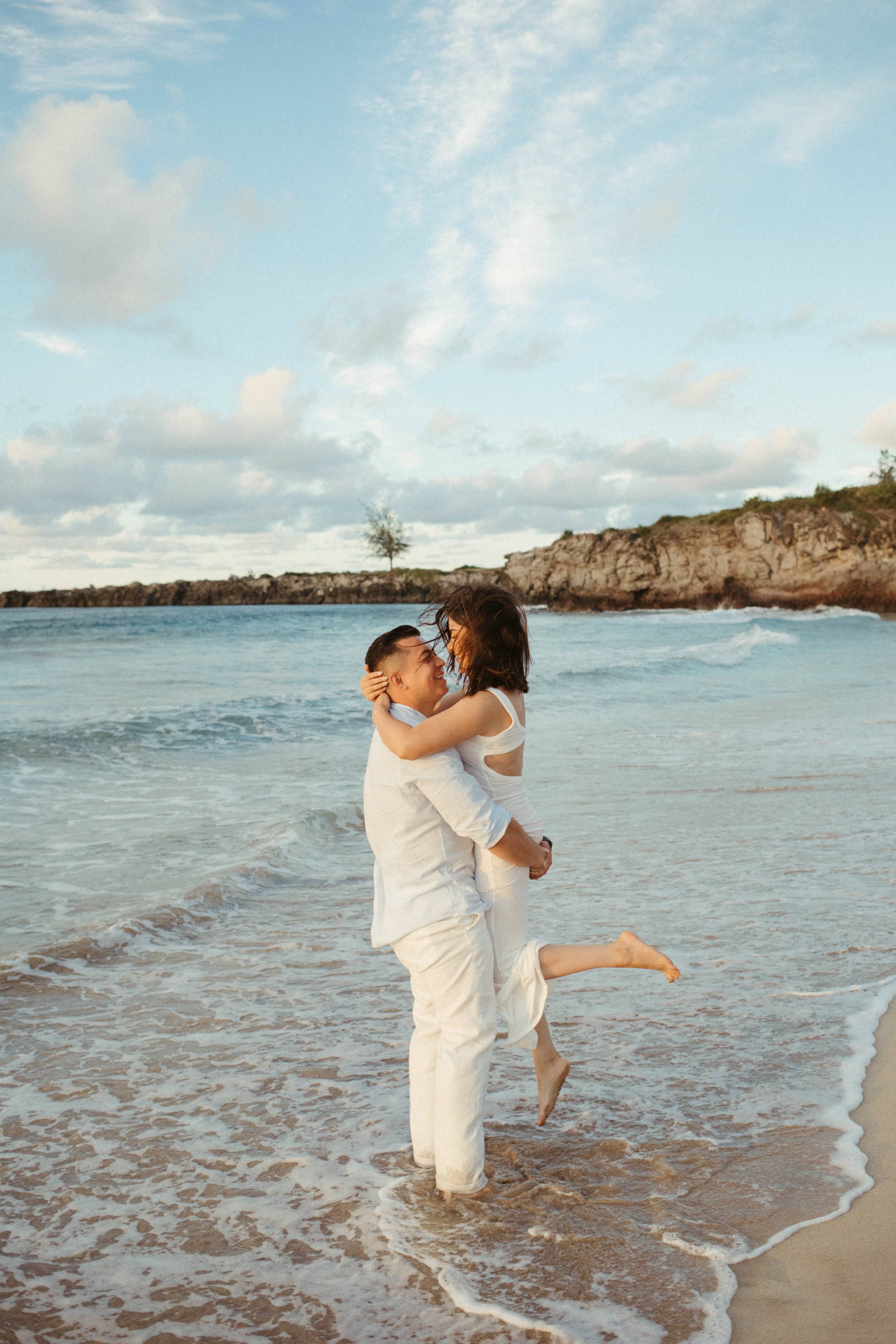  Couple doing the hug lift on their couples photoshoot  