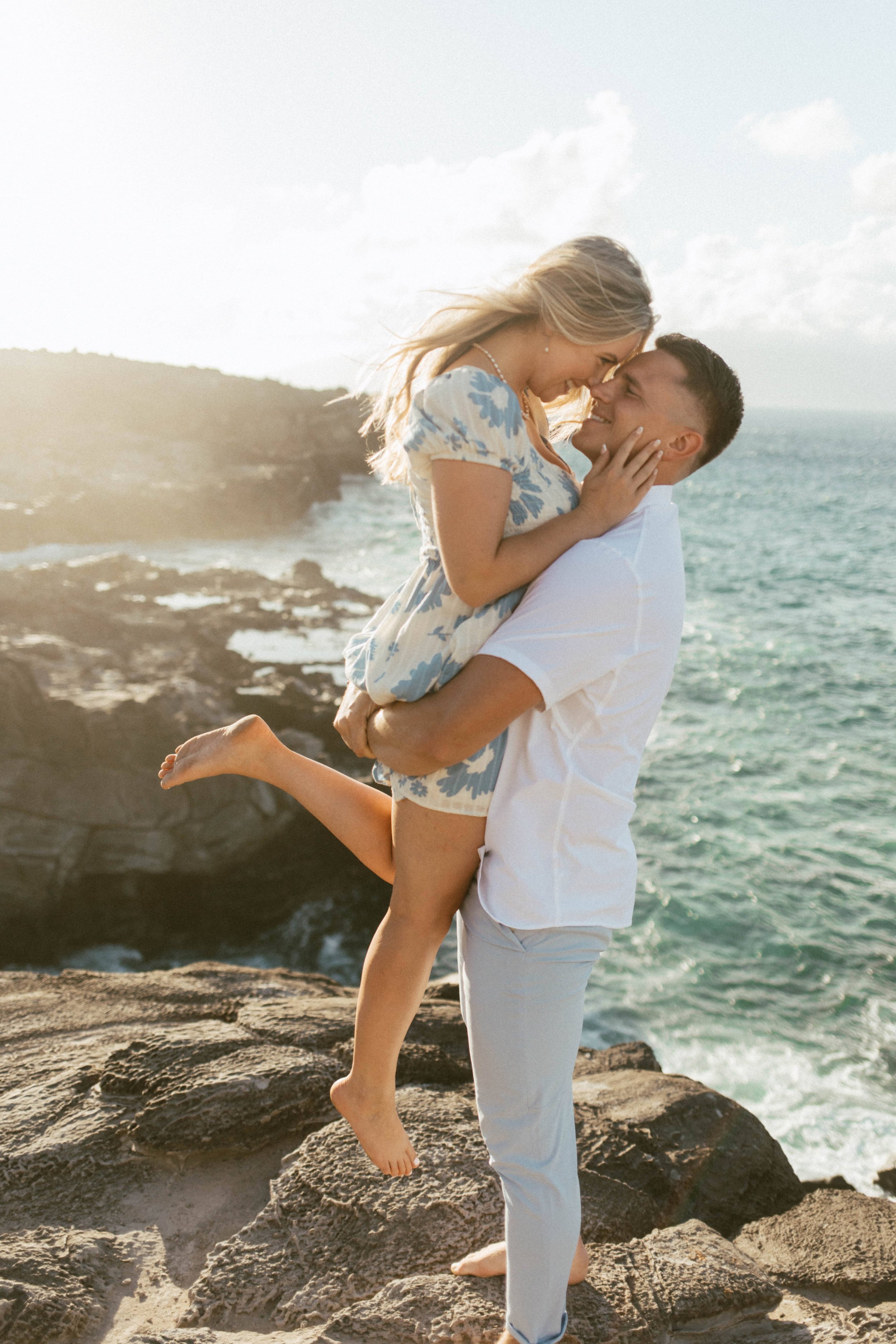  Couple doing the hug lift on their couples photoshoot  