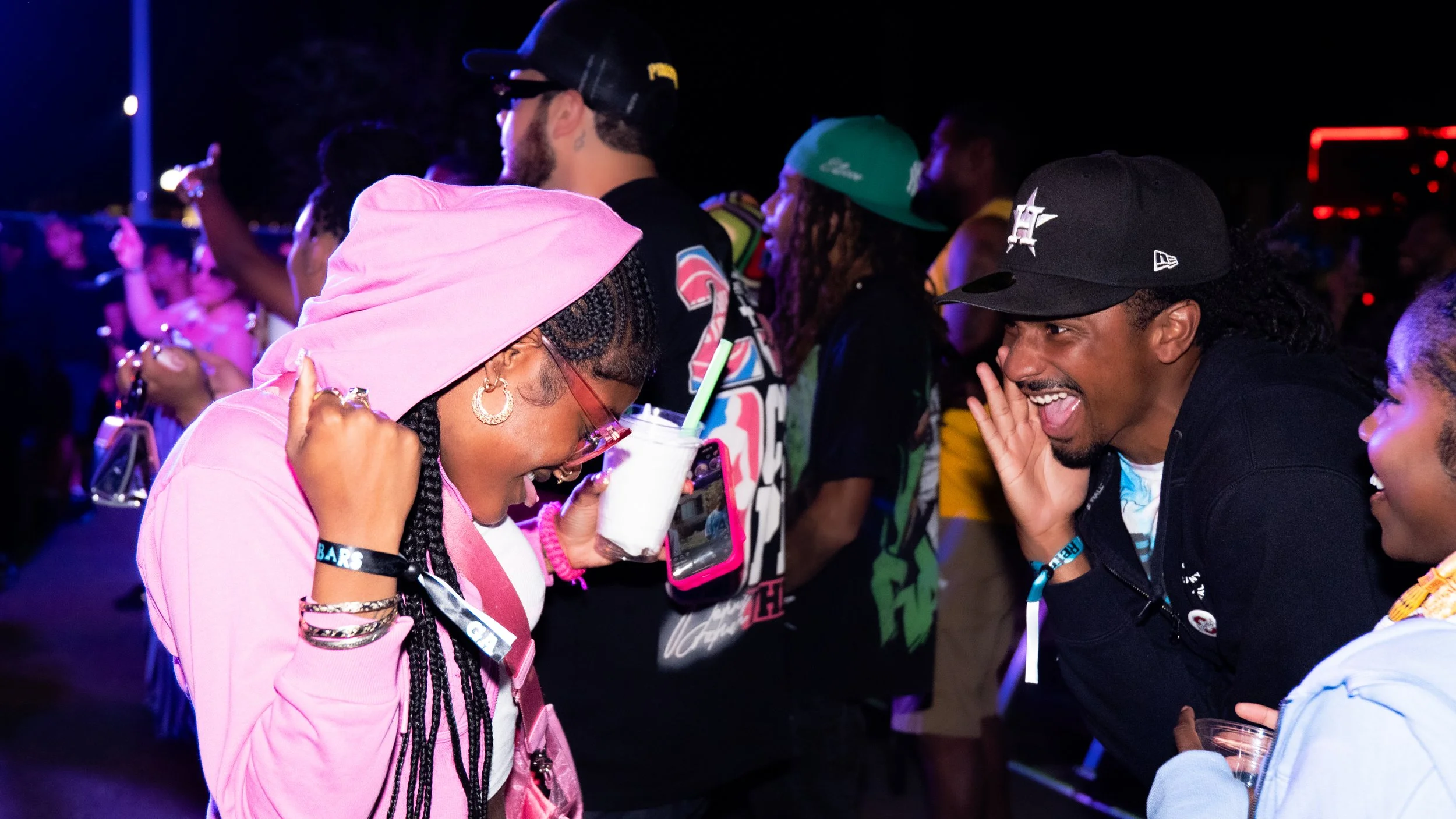 concert goers dancing photography