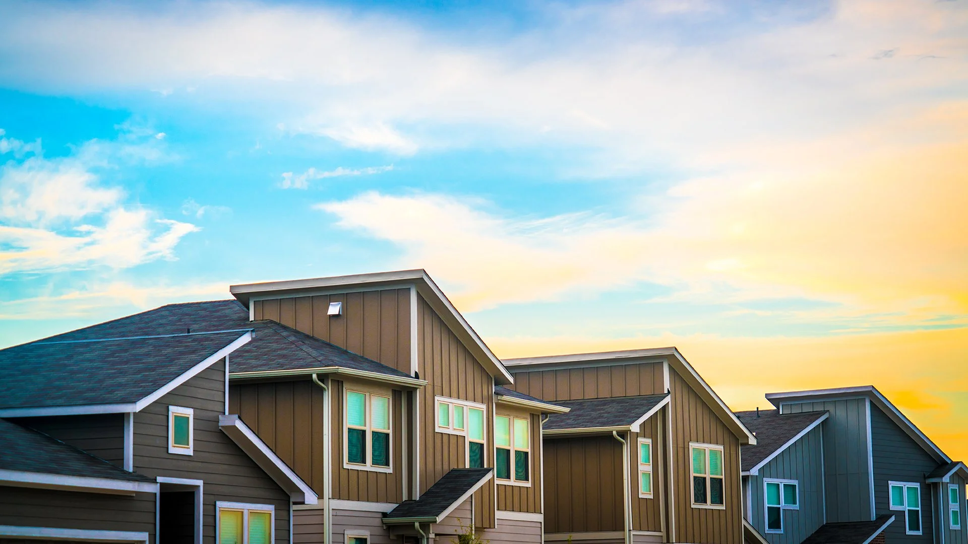 Townhomes against a beautiful evening sky