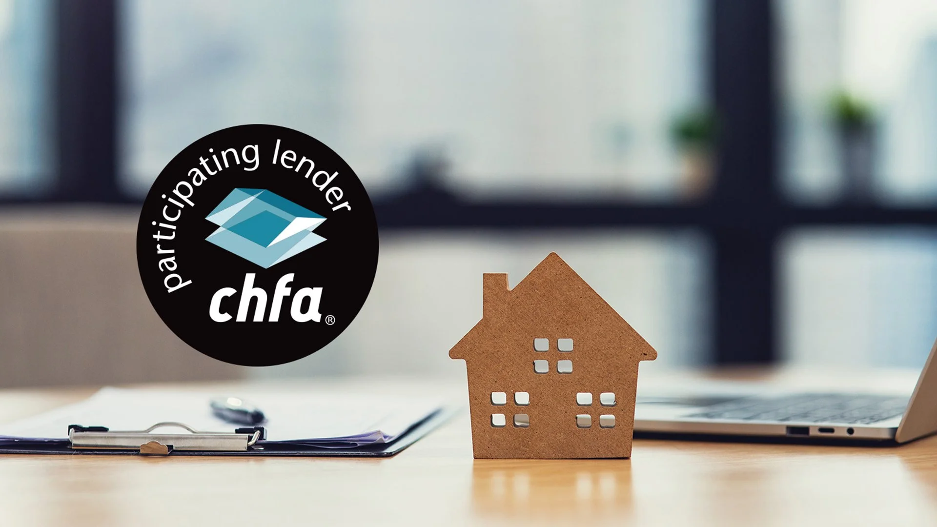 Image of CHFA Participating Lender Badge and graphic of house