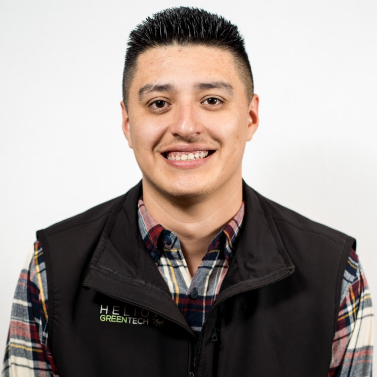 Helio GreenTech logo with a stylized leaf and sun design