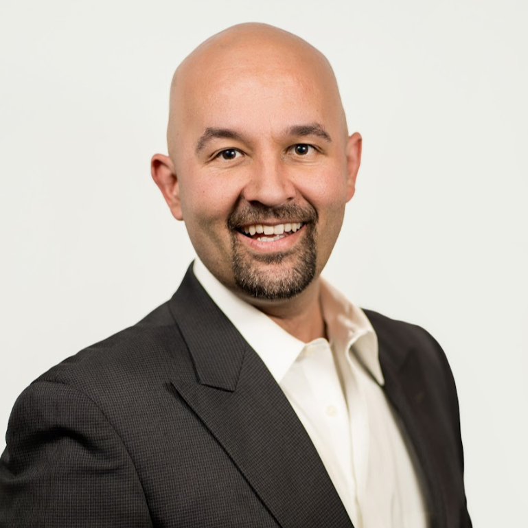 Logo for Helio Greentech featuring a stylized goat's head inside a sunburst design with blue and green color scheme.