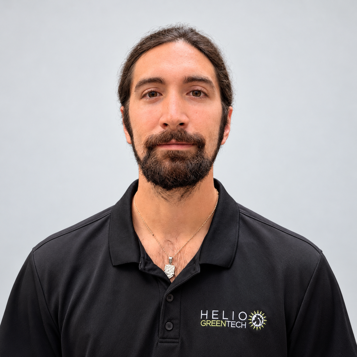 Jesse Hiser wearing a black Helio shirt.