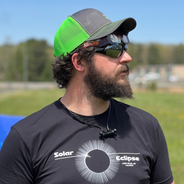 Logo for Helio Greentech featuring the company name and a stylized sun and leaf icon.