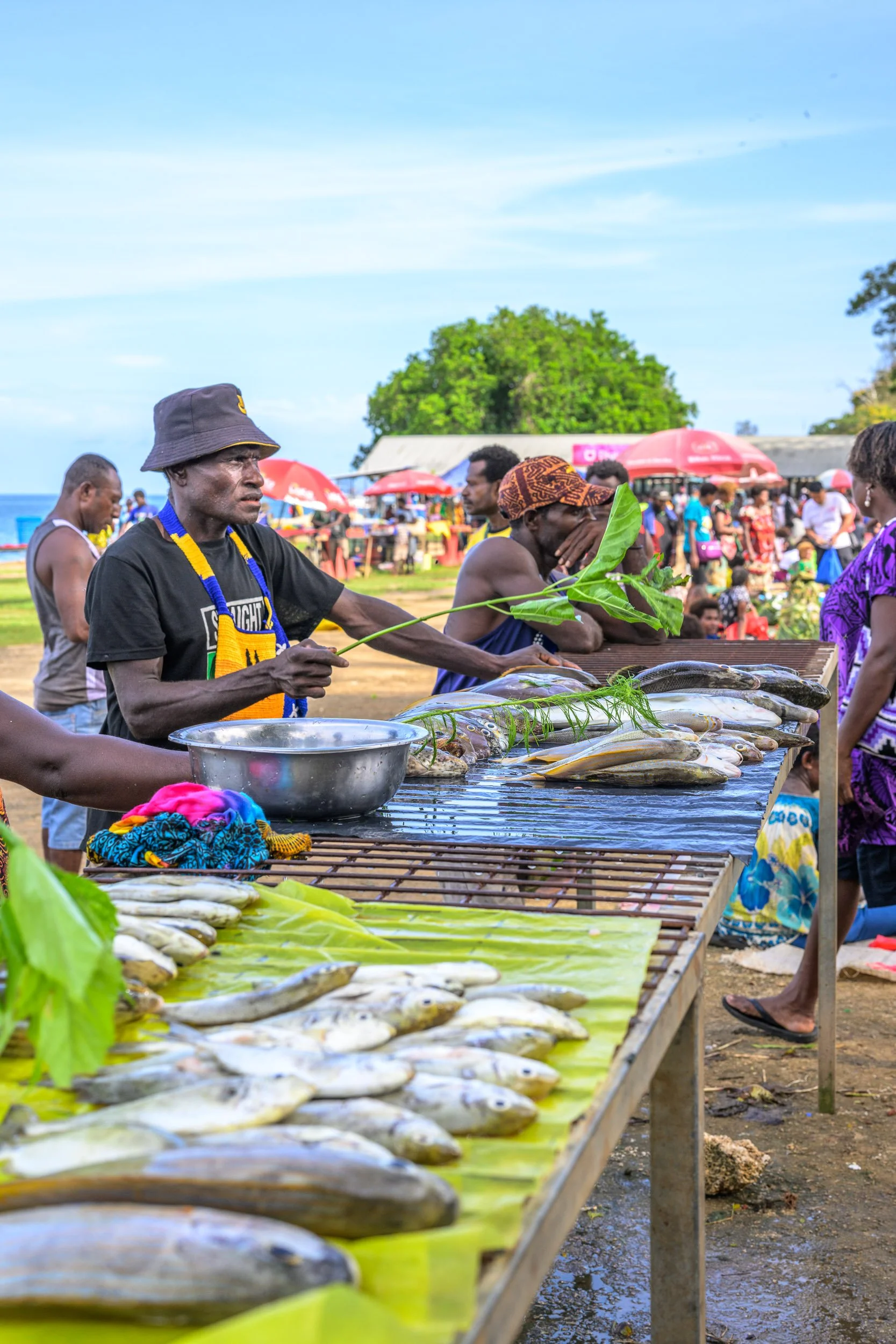 Vendors and visitors at the Saturday Market in Kavieng, New Ireland Province, Papua New Guinea.