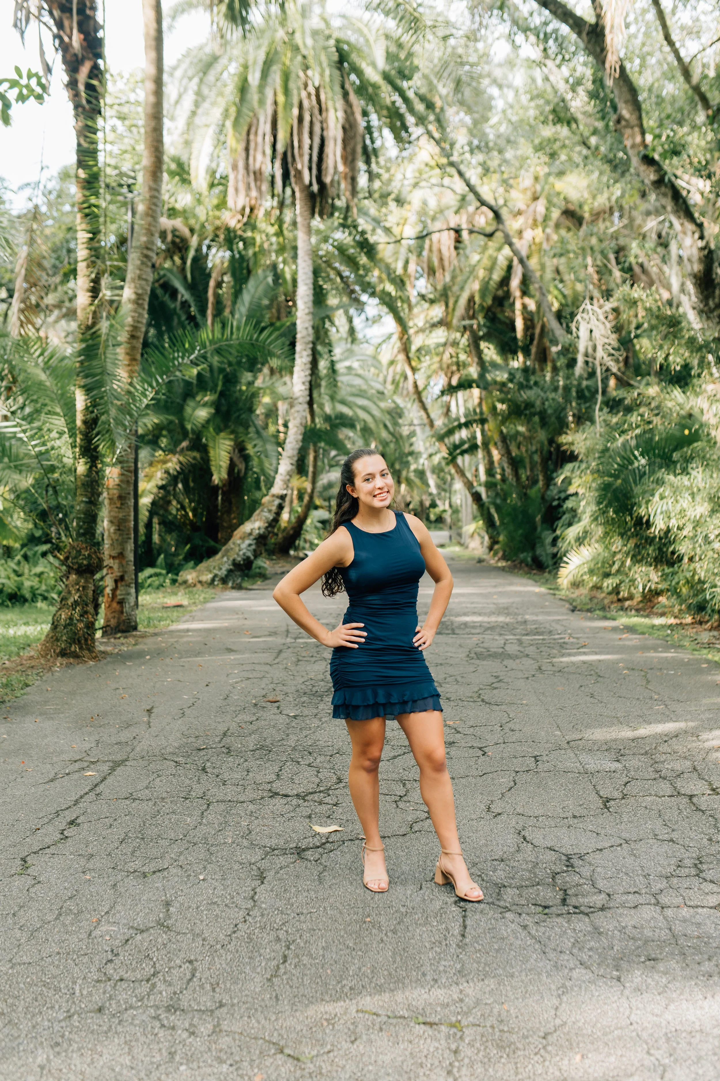 senior girl during her senior session at FIT Botanical Gardens in Melbourne Florida