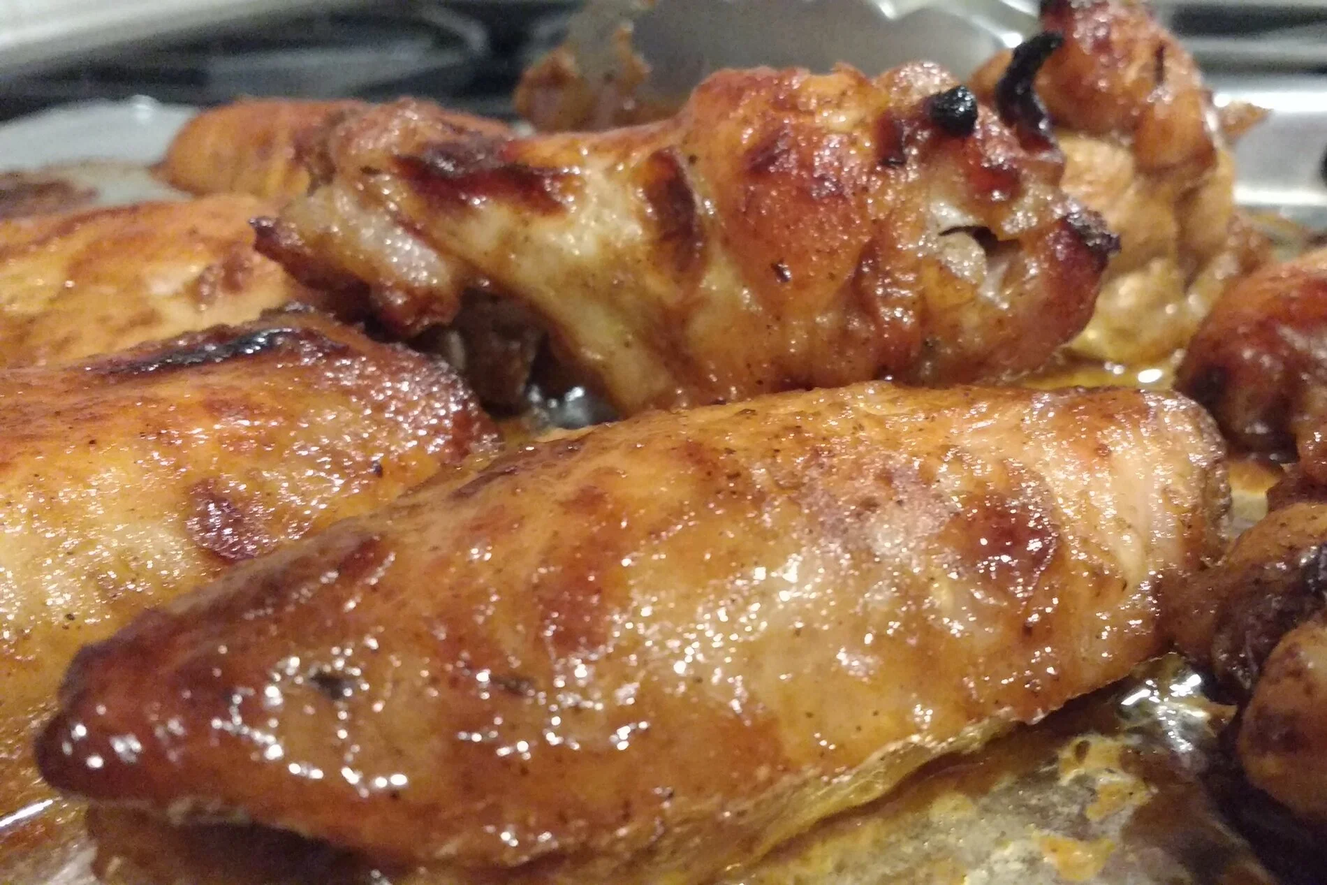 Finger licking chicken wings easy to make with Nals Kitchen Honey Ginger Dressing and Ginger Spread