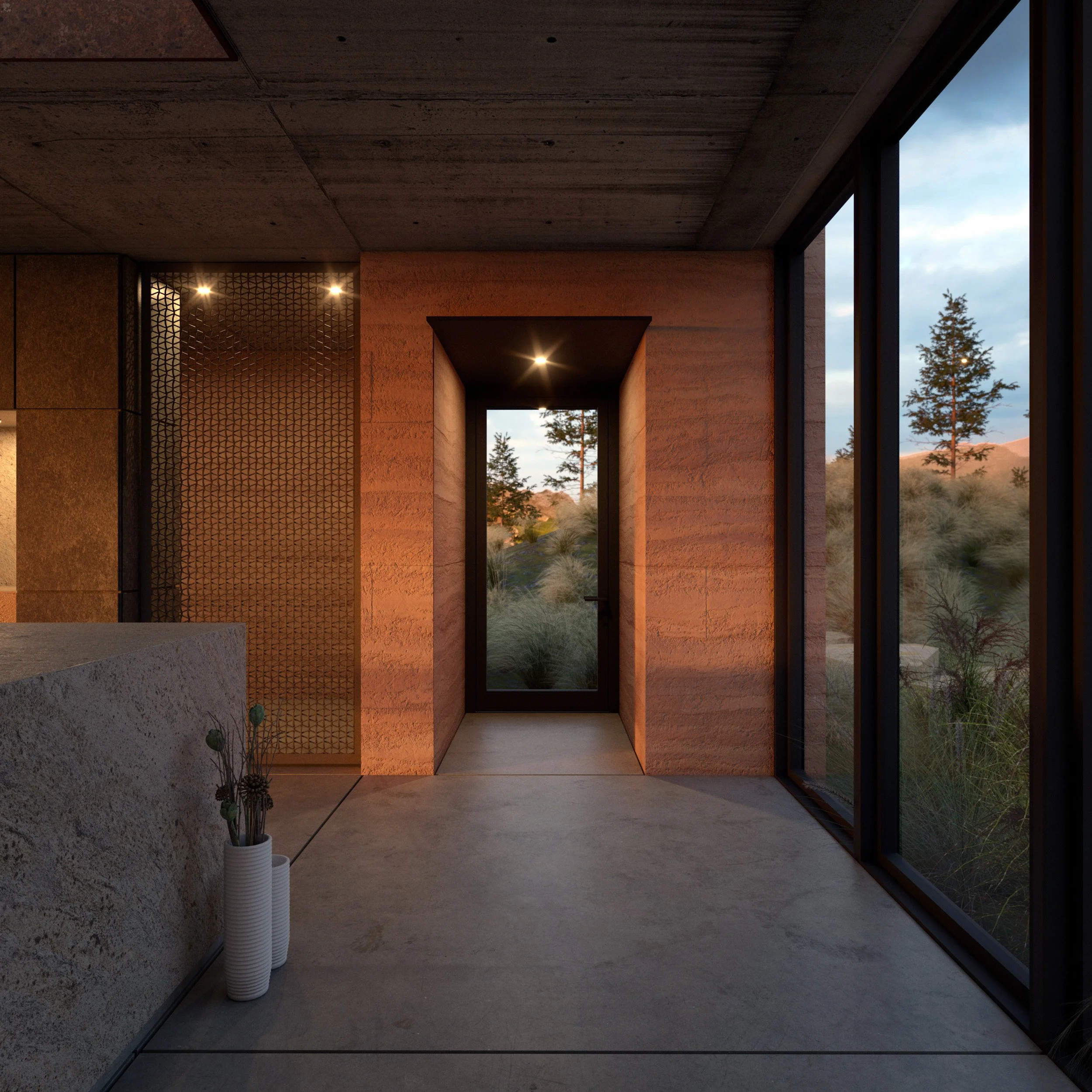 Interior corridor with concrete floors, textured walls and full-height glazing looking into the surrounding trees.