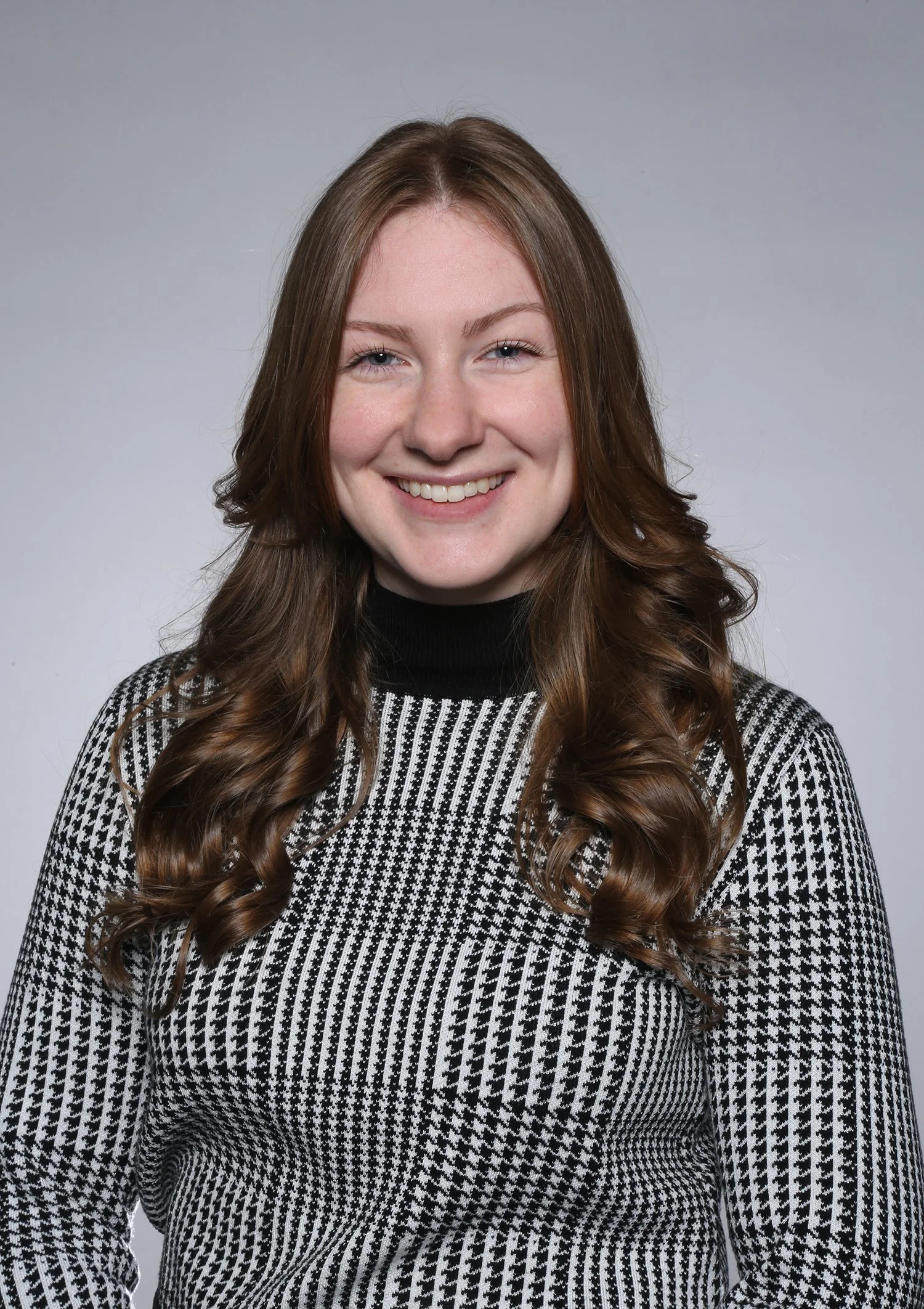 Headshot of Dr. Victoria Stout, therapist specializing in anxiety, mood disorder, trauma, and CBT at Careful Counseling in Brookline, MA.