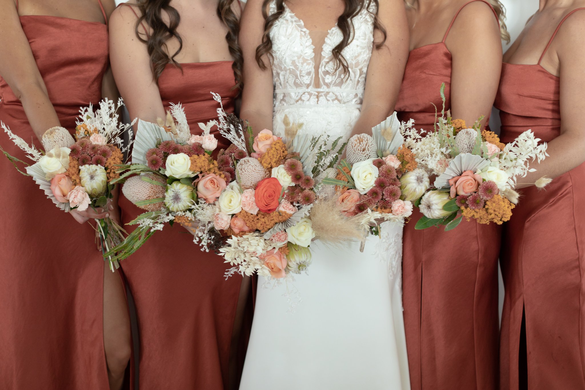 wedding photography Kalbarri bridesmaids and flowers.jpg