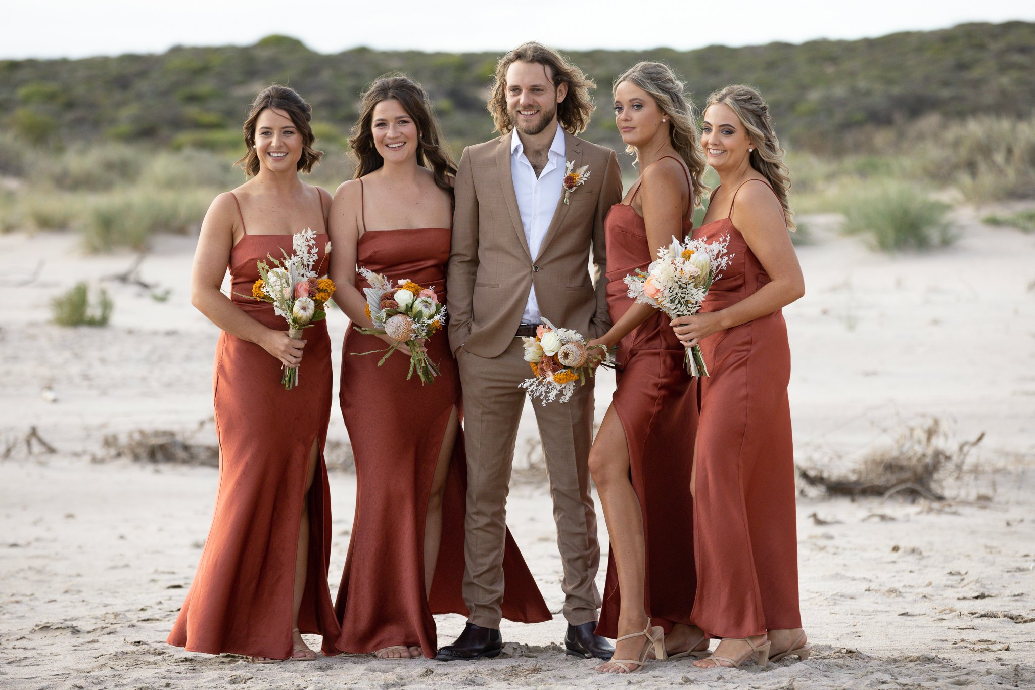 Kalbarri wedding photography with bridal party at the beach.jpg