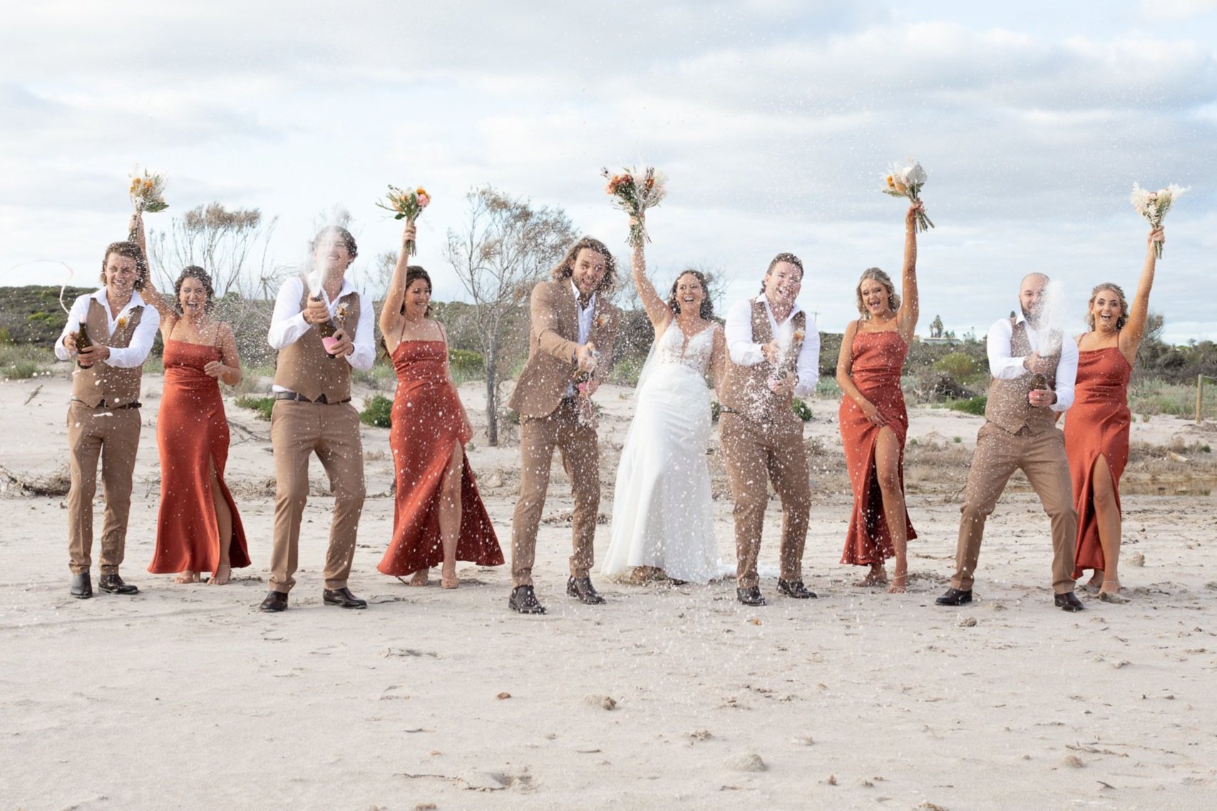 kalbarri wedding photography bridal party champagne pop.jpg