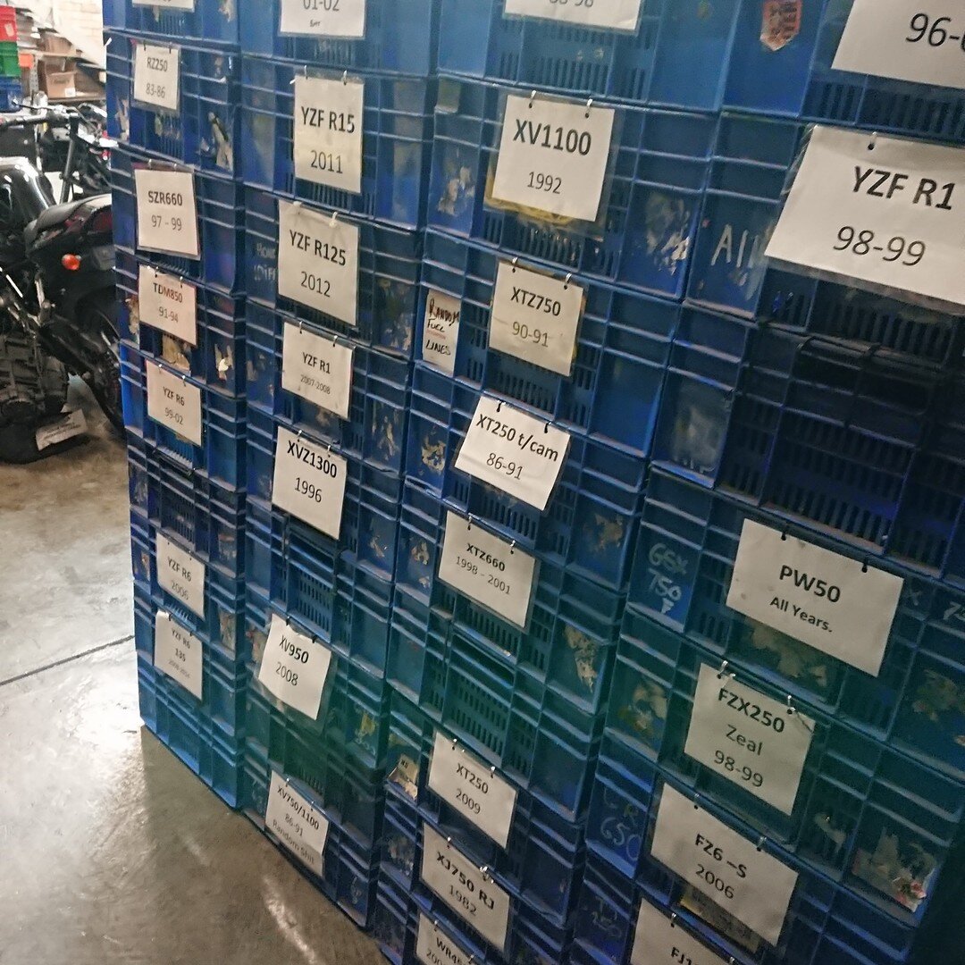 The words laying around dont fly in this wreckers 😎 all our yamaha chassis box's organized, in matching blue crates ready to go on the shelfs :) parts organization and superior mechanical work is our aim here :) #motorcycle #wrecking #twowheelwrecke