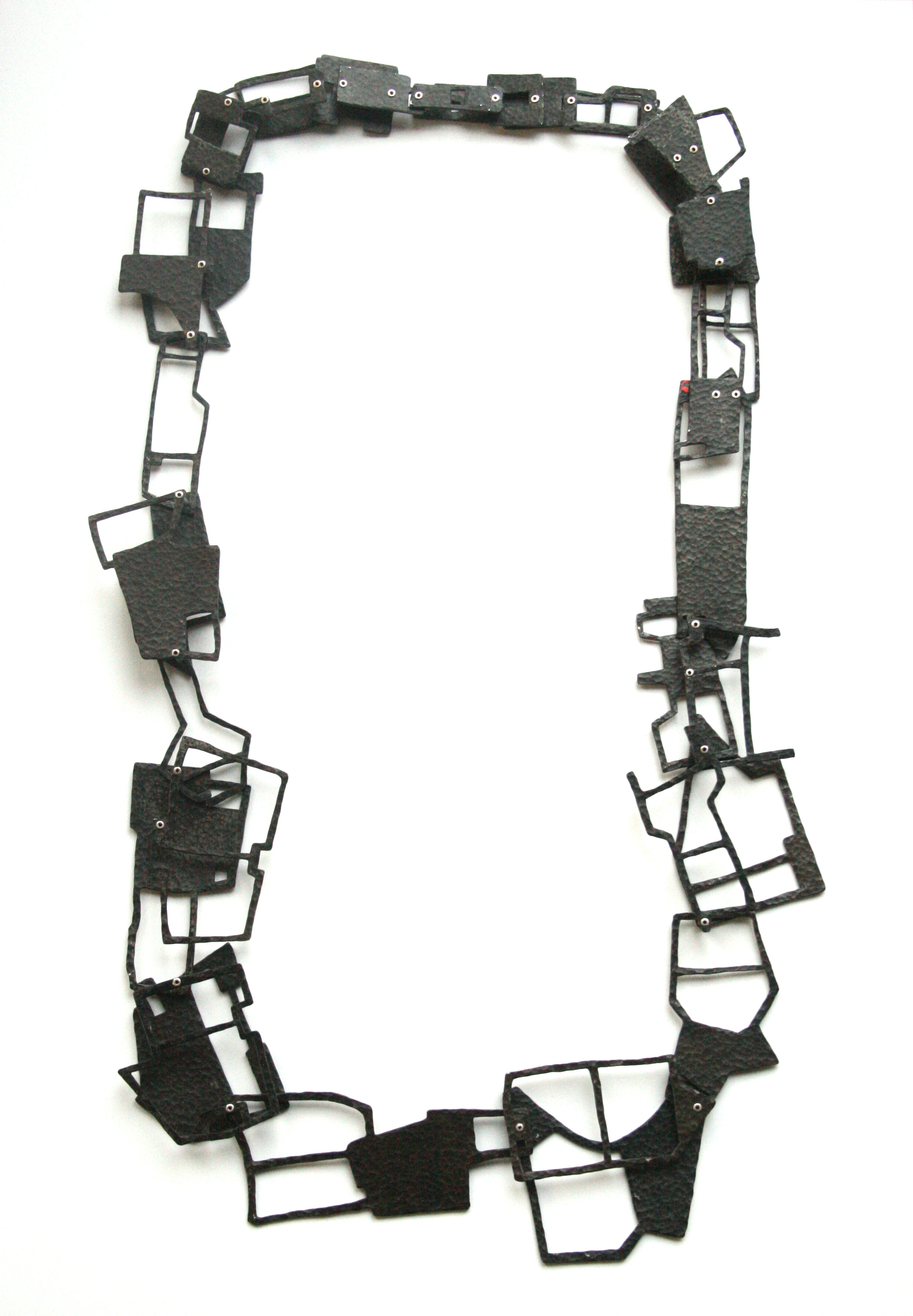 'Langgewagt' - Materials: hammered steel, silver, aluminium - Collection CODA Museum, Apeldoorn
