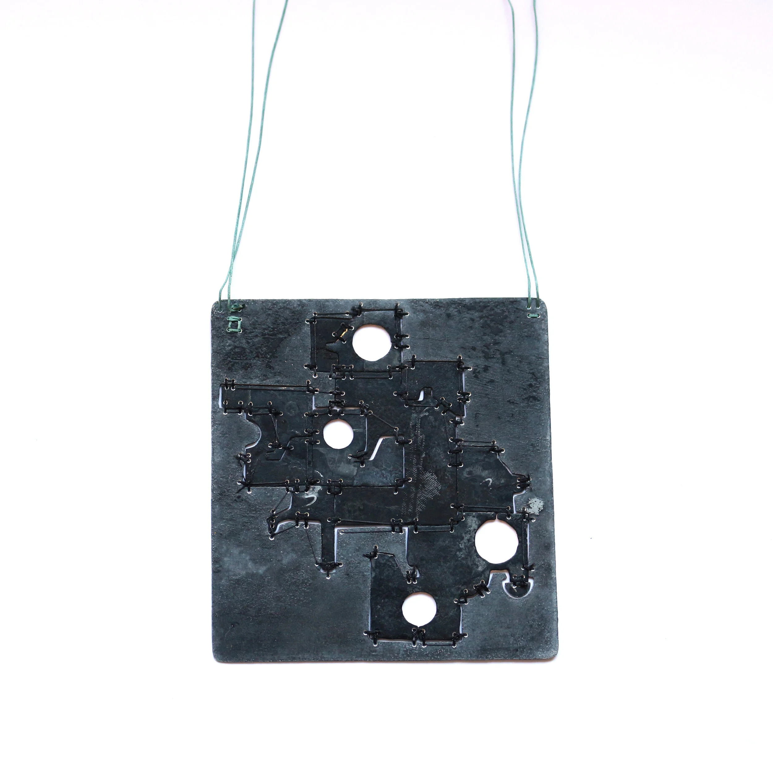 Hanger /back/ - Materials: zinc, gold leaf, Chinese beading rope, silver, aluminium.