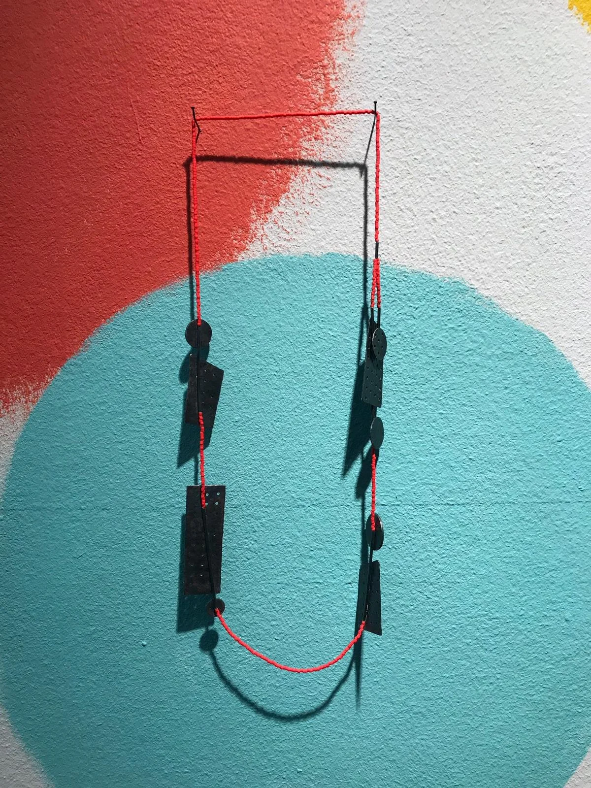Angles and Circles - Materials: silver, Japanese glass beads, nylon thread - private collection
