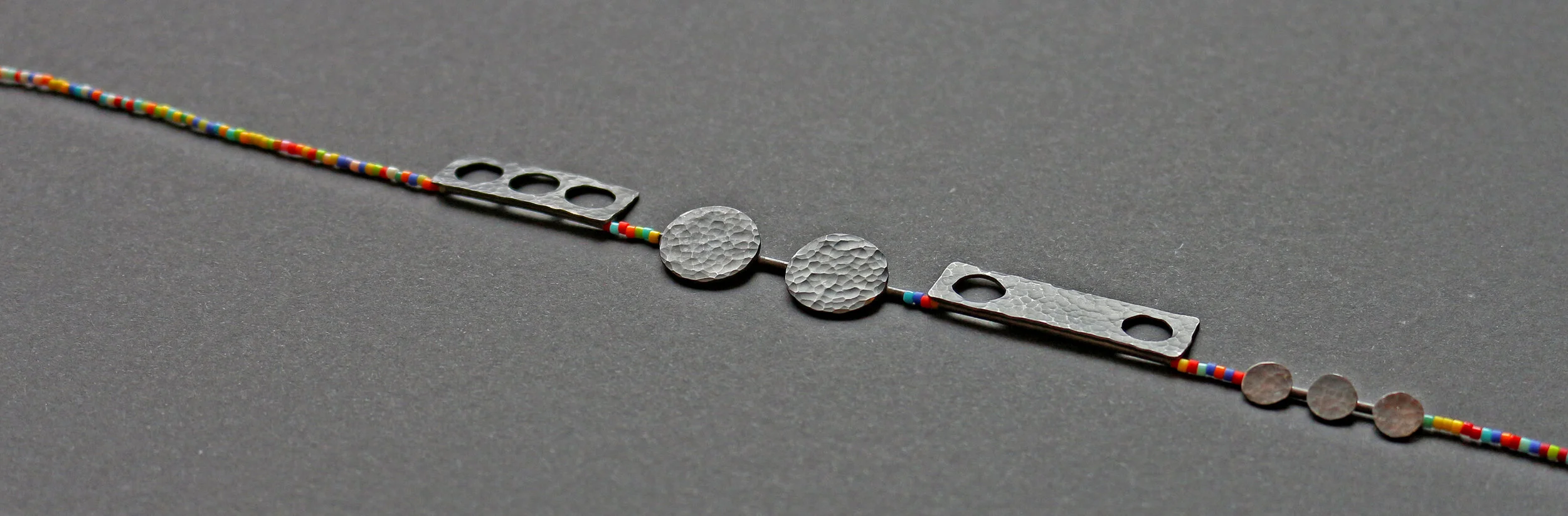 Rhythm /close up/ - Materials: silver, Japanese glass beads, nylon thread.