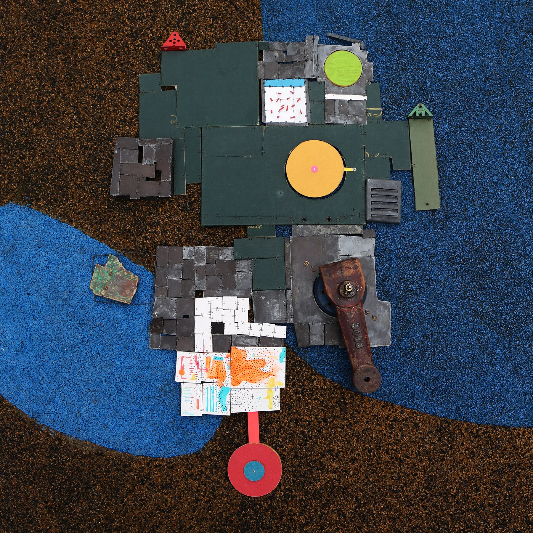 Portrait - Materials: Etched zinc, book covers, plastic, found objects, wooden machine molds, paint, shrinking plastic, iron wire, emaille, steel, found wood, Meccano, rope, leather - sold 