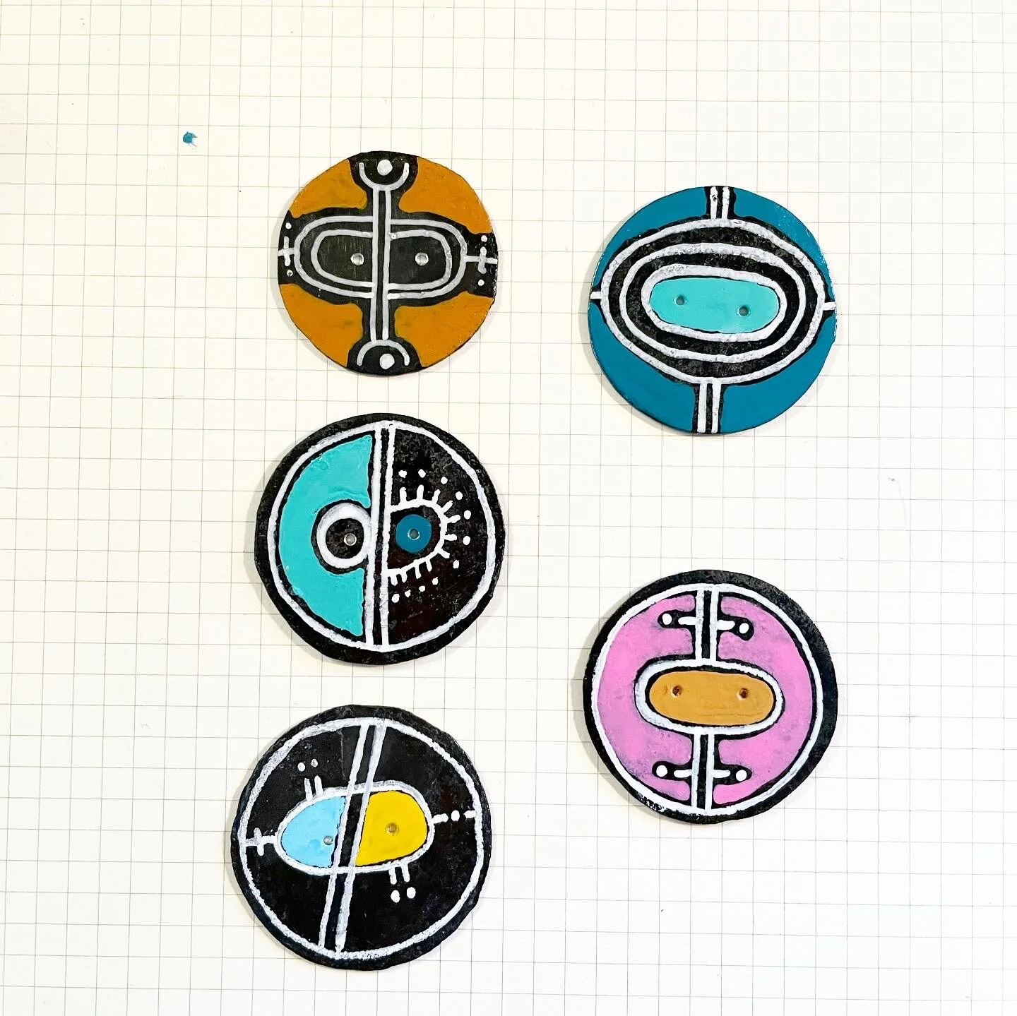 buttons made of zinc and paint - not washable, so it is only suitable for coats and other garments you dry clean